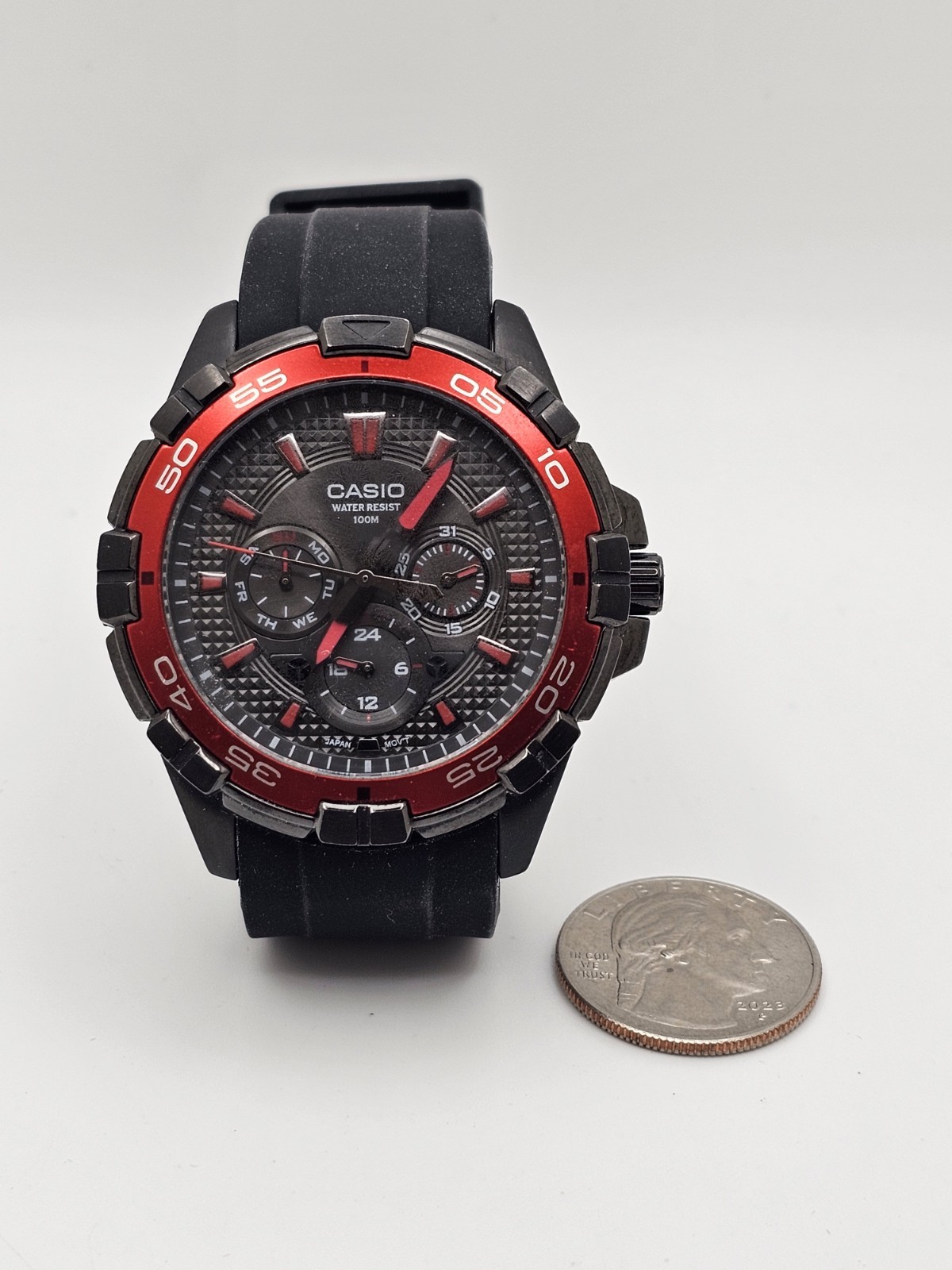 2013 Casio Quartz MTD-1069 Men Multifunction Daydate Watch Red Bezel Curved Band