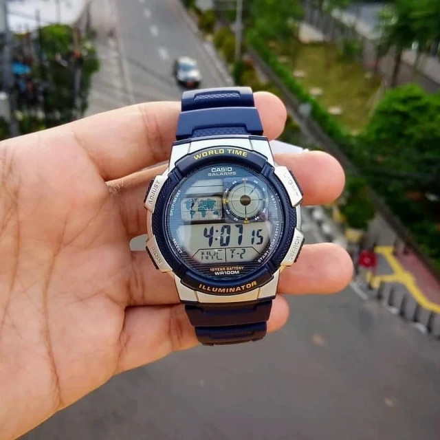 Casio AE1000W-2AV Digital Watch WR100 World Time 10 Year Battery LED