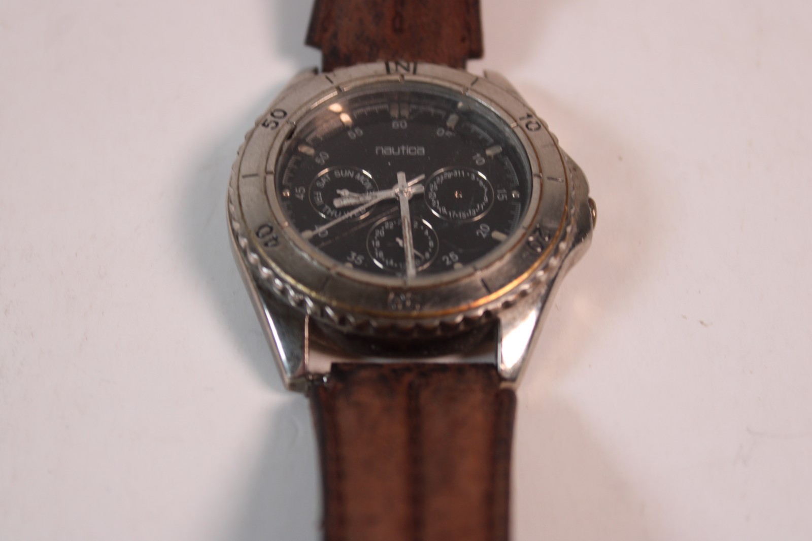 Nautica Men’s NXXXXXX Stainless Steel Round Multi-Function Watch dead battery