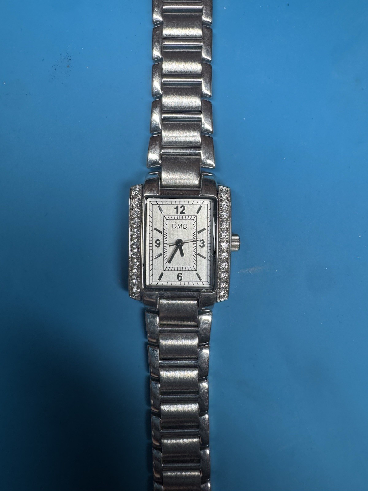 DMQ Women’s Silver Tone Rhinestone Dress Watch – Quartz – New Battery