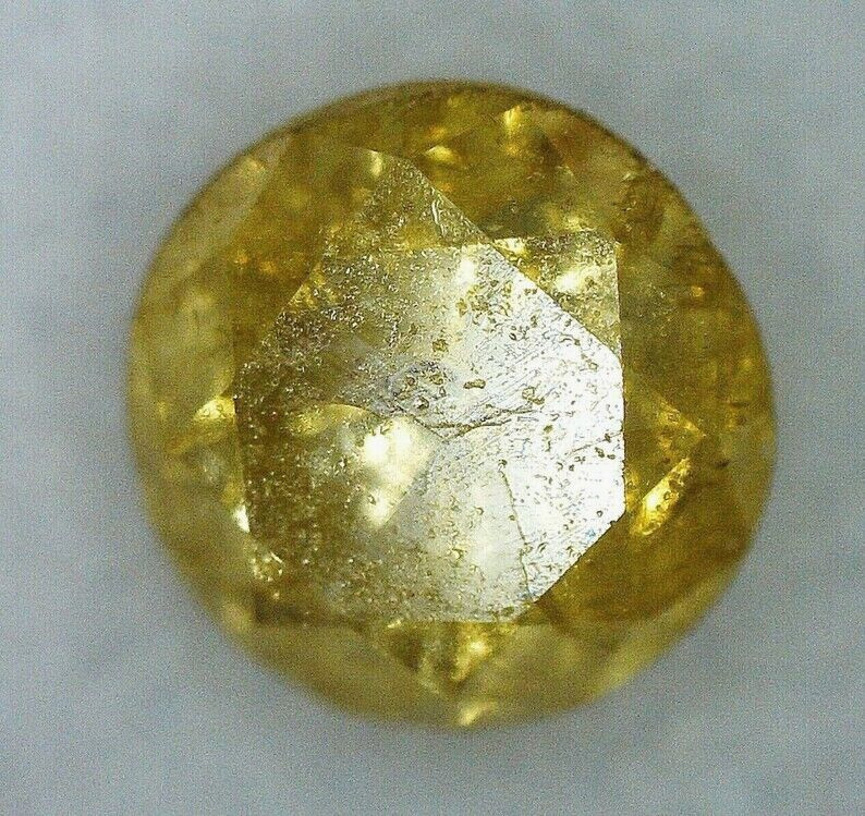 Natural and untreated 2.56mm yellow diamond