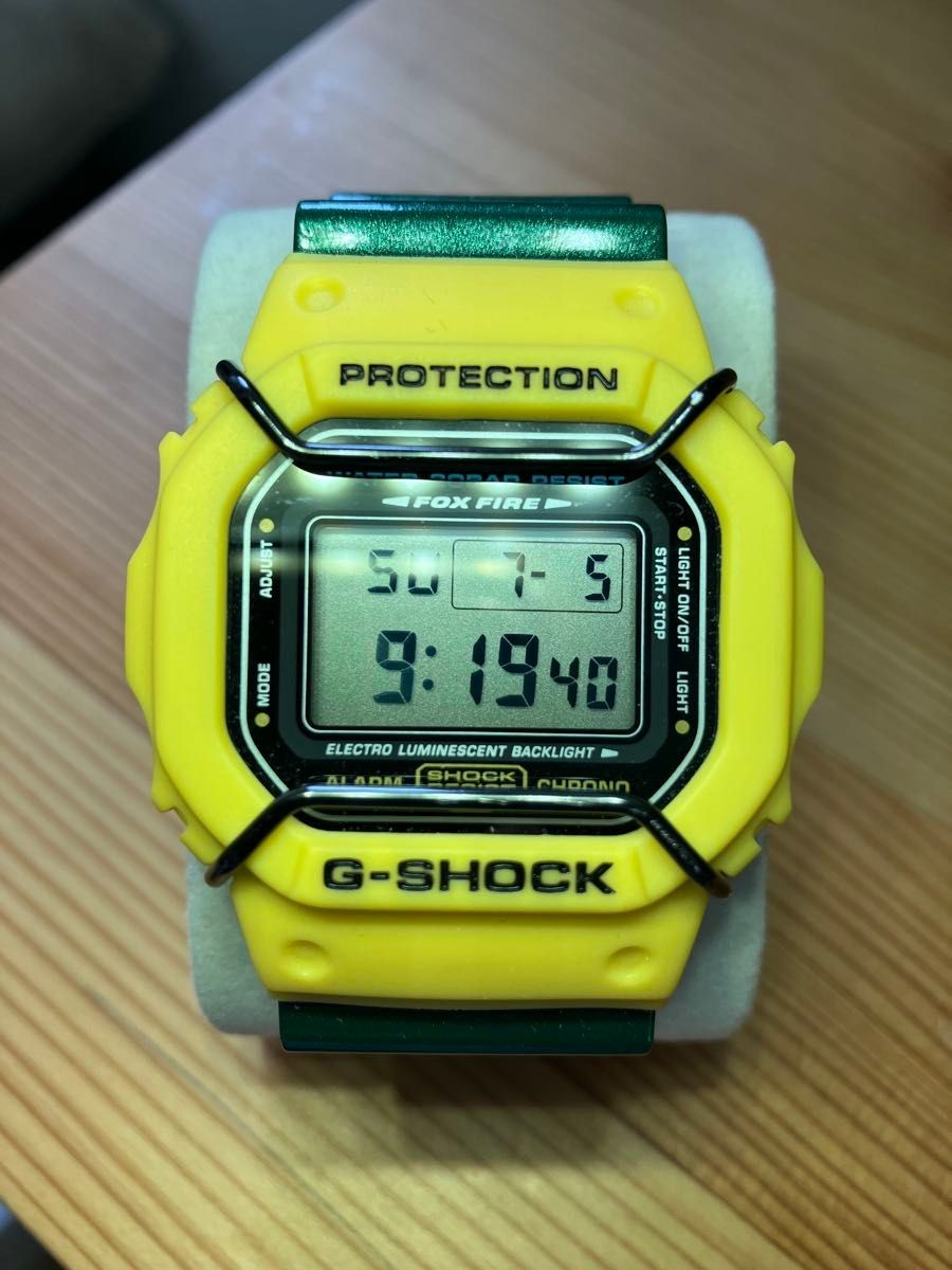 CASIO G SHOCK DW 5600 yellow with protector