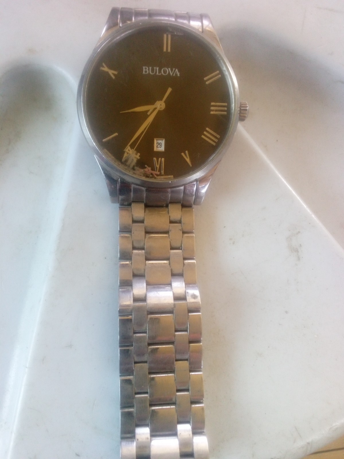 96B261 BULOVA CLASSIC BLACK DIAL STAINLESS STEEL MEN’S WATCH M-476