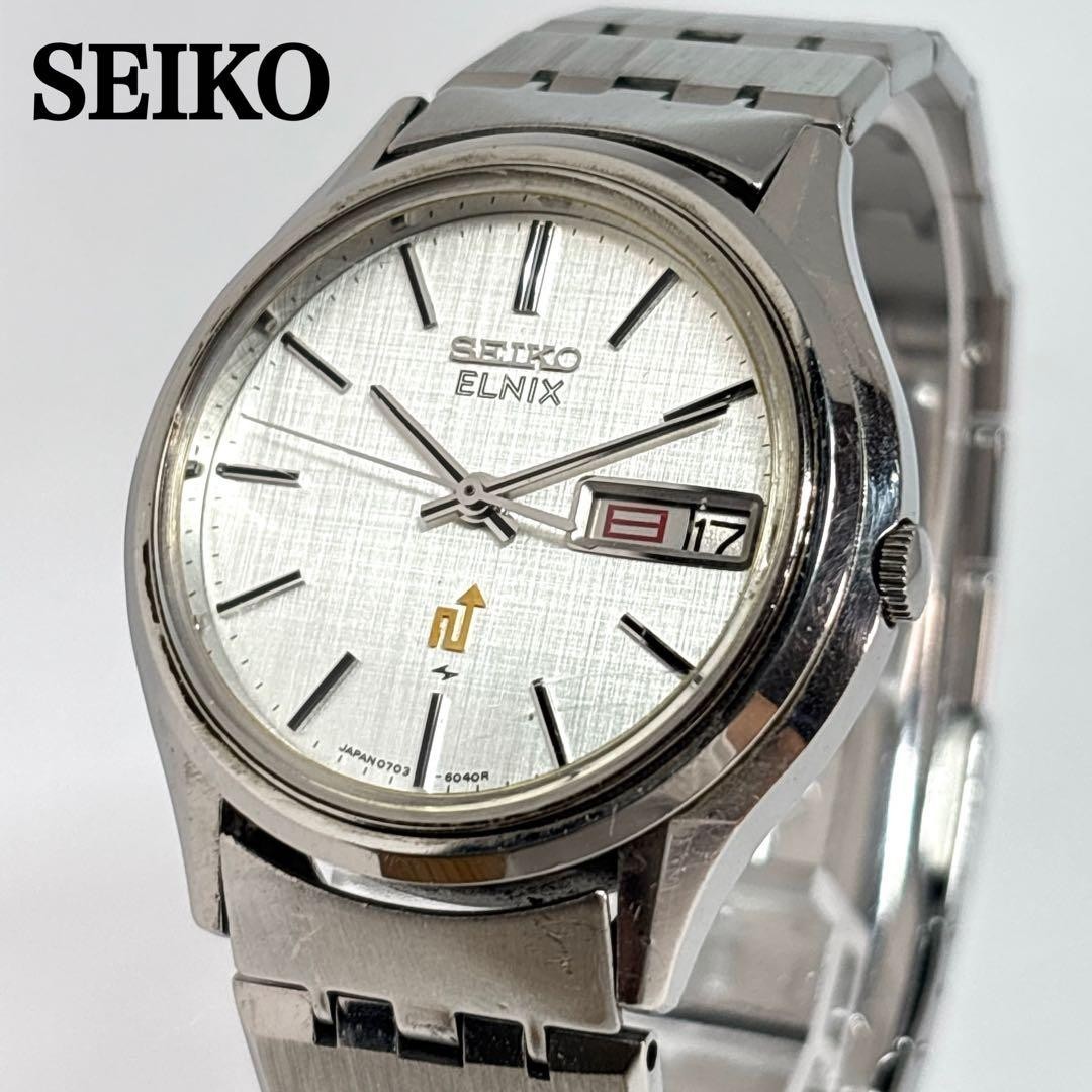 Seiko ELNIX 0703-6011 Quartz Wristwatch 34mm Silver Dial wrist 16cm/6.3in JAPAN