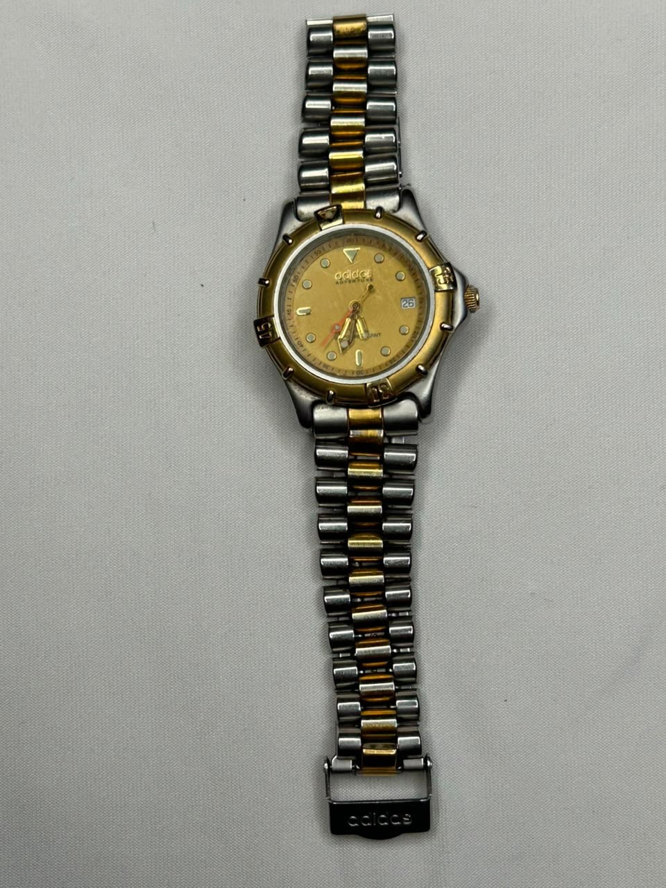 ​”Vintage Adidas Adventure watch with scratches. Not working, for repair/parts.”