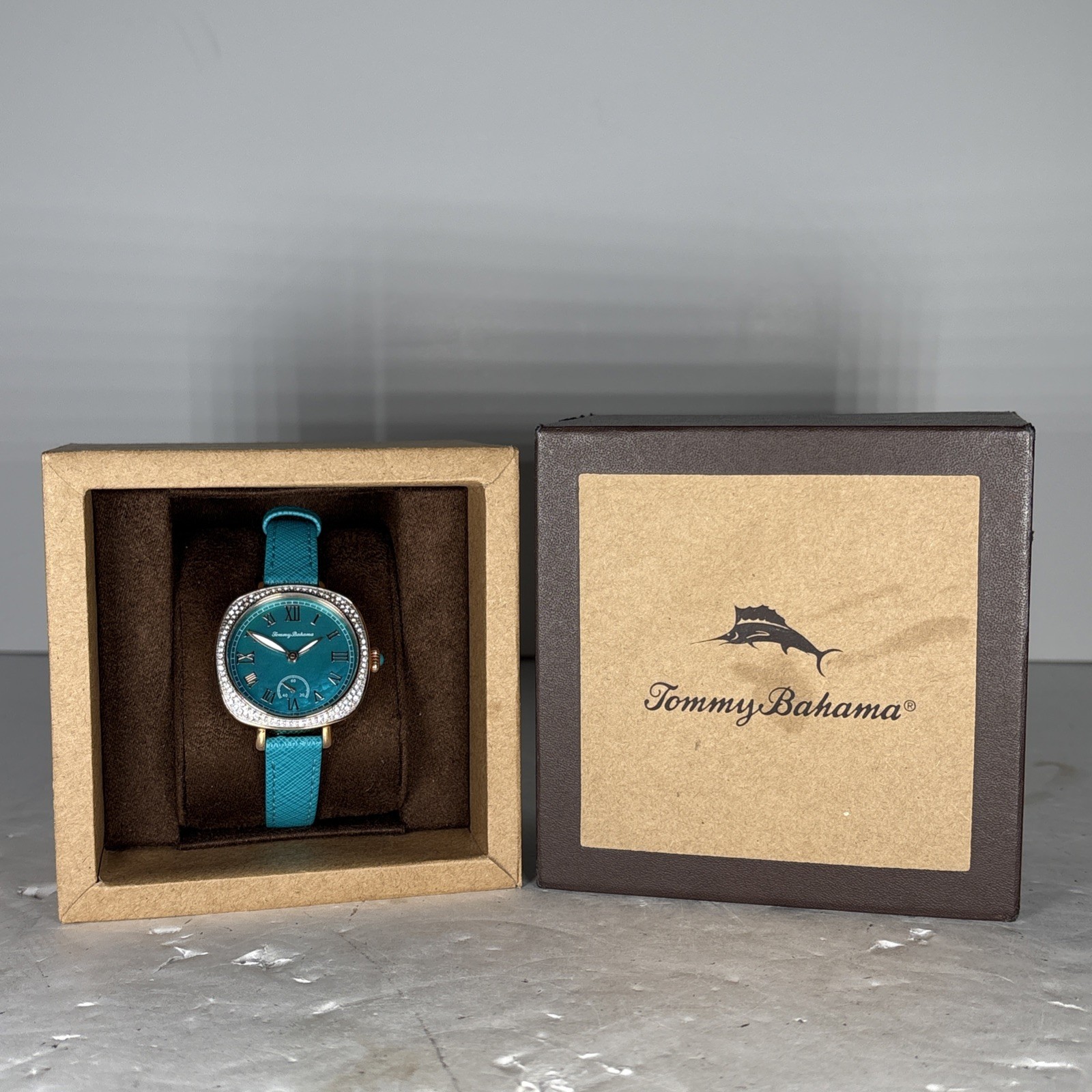 Tommy Bahama Teal Mother Pearl Dial Gold-Tone Watch Crystal Bezel Leather Strap