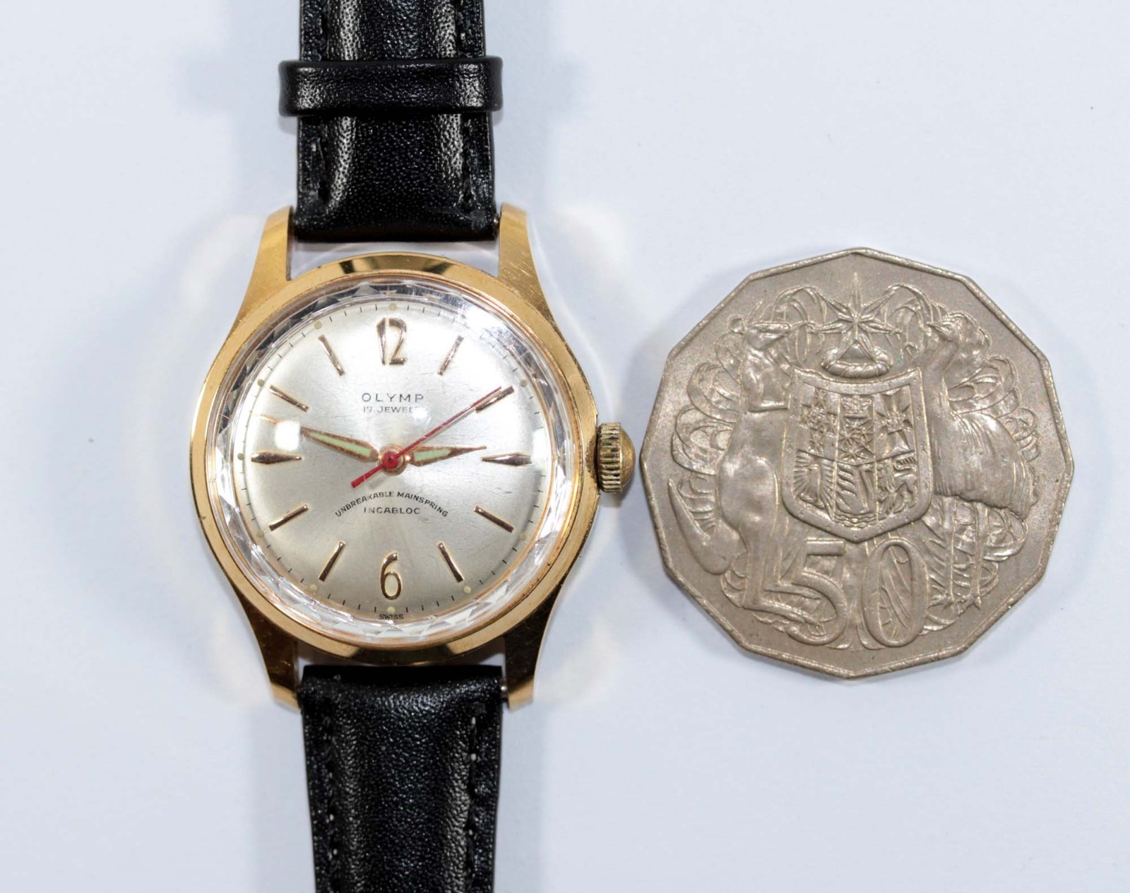1950s AUST BRAND OLYMP SMALL GENT’S WATCH 17 JEWELS SWISS MANUAL FACETED GLASS