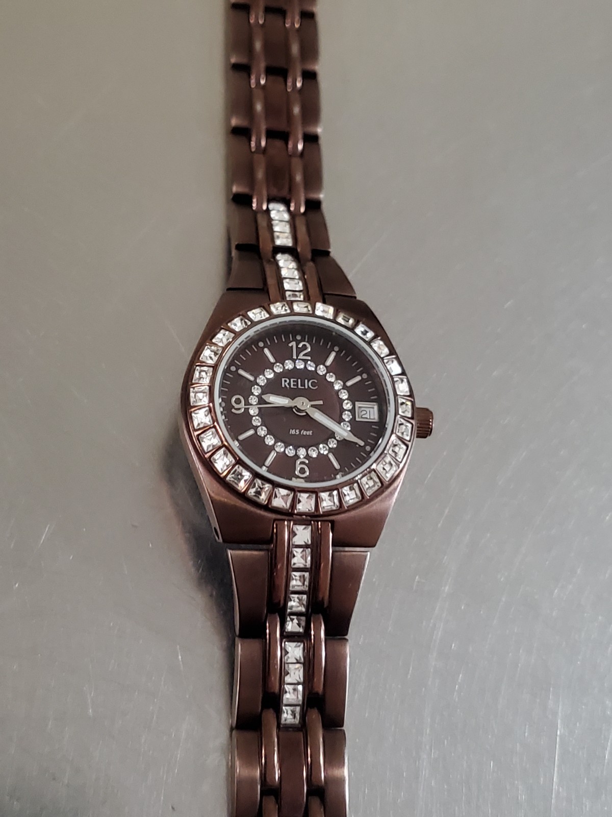 RELIC Watch Women’s Analog Quartz Bronze Tone Date Gemmed MOP 6.25 inch 26 mm