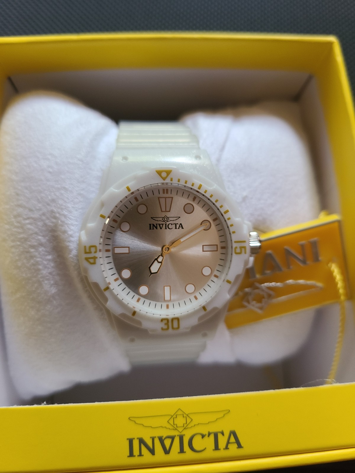 Invicta Women’s White Watch With Silver Face And Yellow/Gold Accents