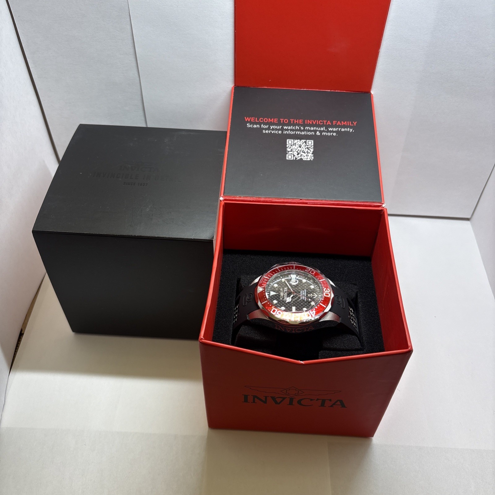 Invicta 47688 Ocean Voyage Watch 47mm Carbon Dial Black Red Bezel NEW