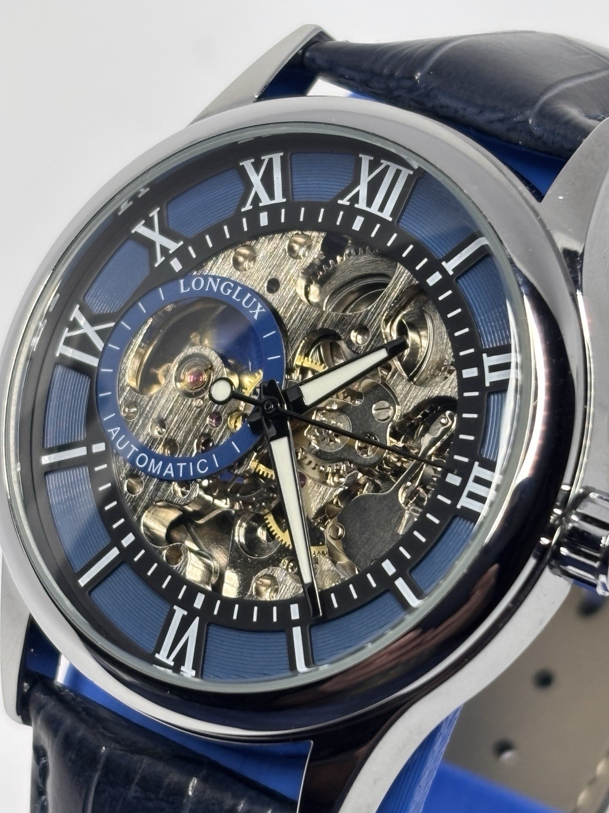 Longlux Automatic Skeleton Dial Roman Numerals Blue Leather Strap SS Watch