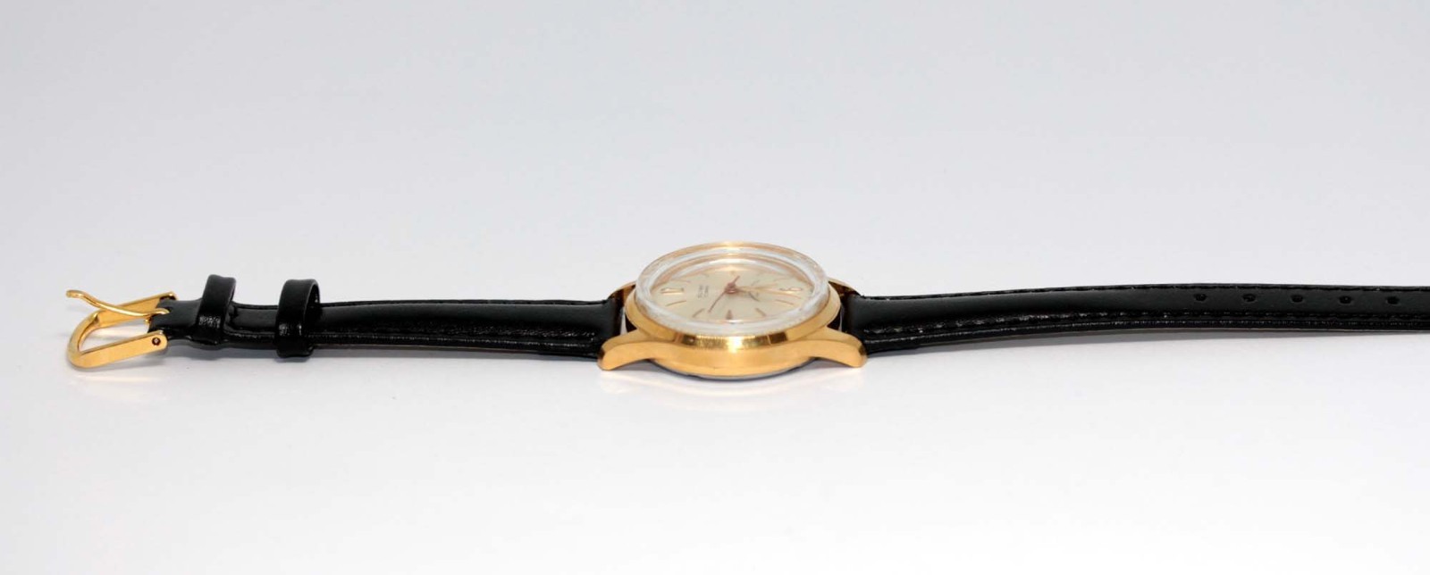 1950s AUST BRAND OLYMP SMALL GENT’S WATCH 17 JEWELS SWISS MANUAL FACETED GLASS