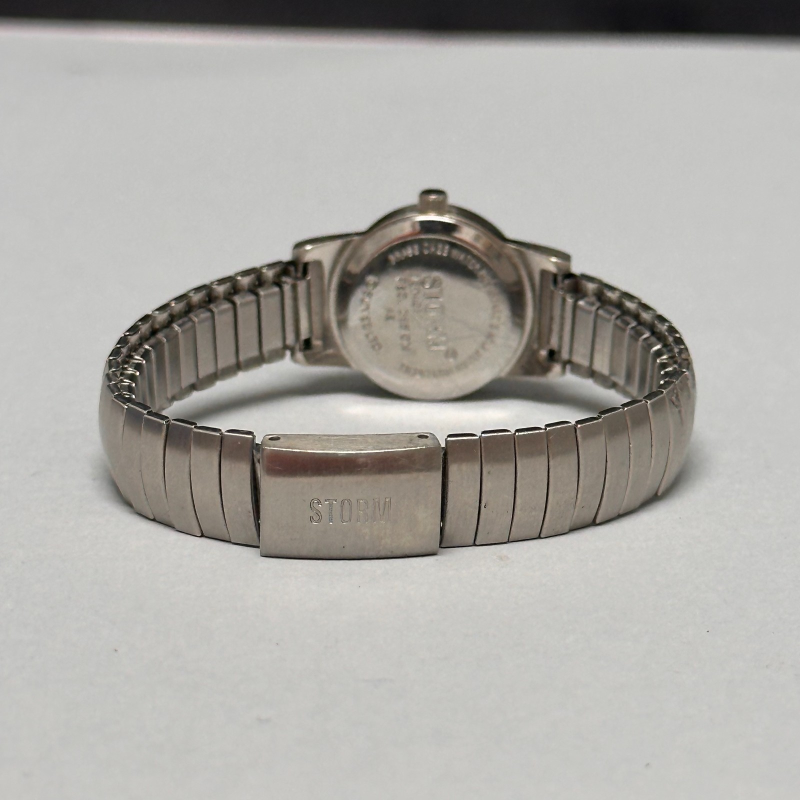 Storm Watch Women Silver Tone Stretch Band Small Round 19MM Dial 6″