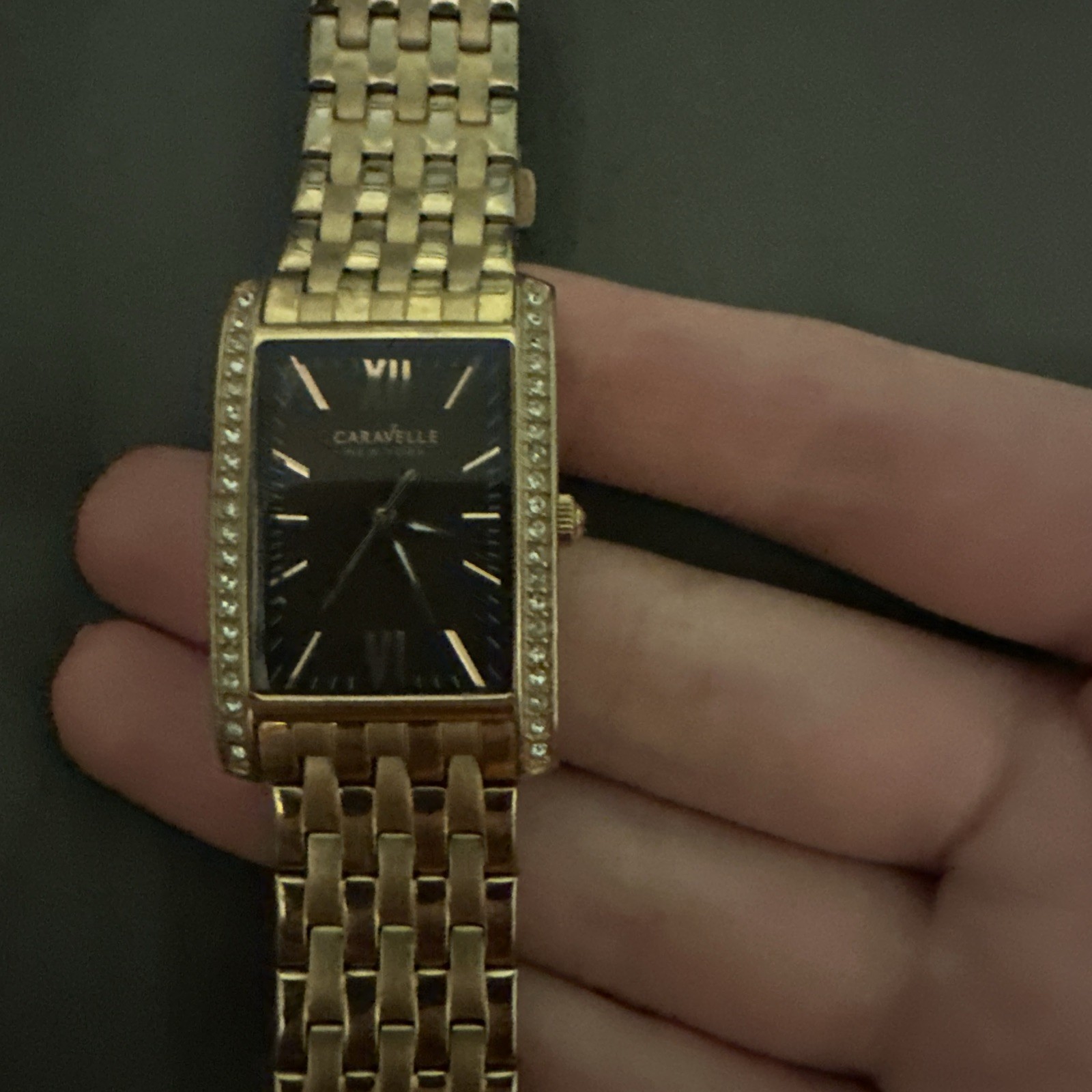Caravelle New York Women’s Gold Diamond Accent Rectangle Watch Black Dial