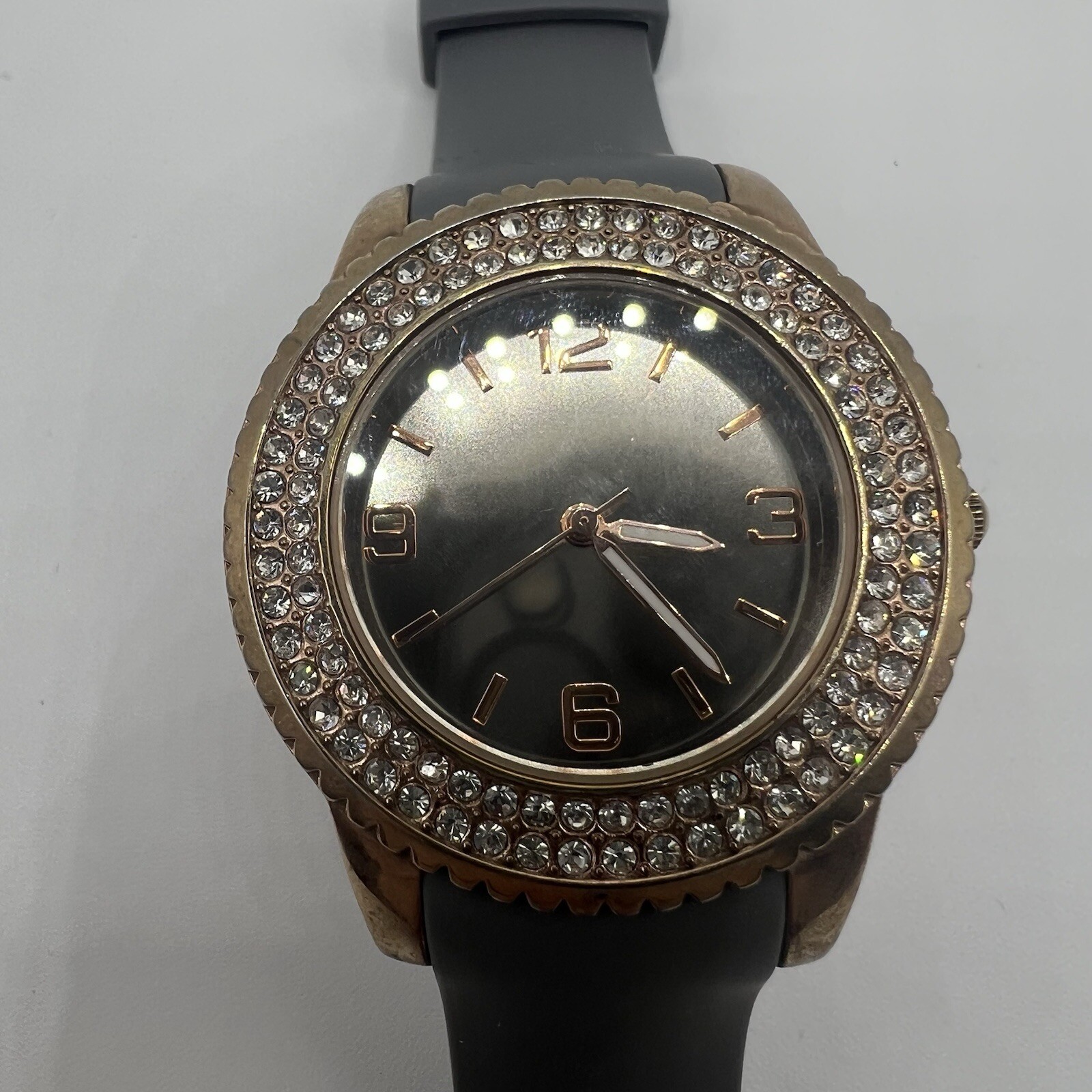 Shiny Mirror Dial Crystal Accent Gold Tone Case Gray Silicone Band Watch