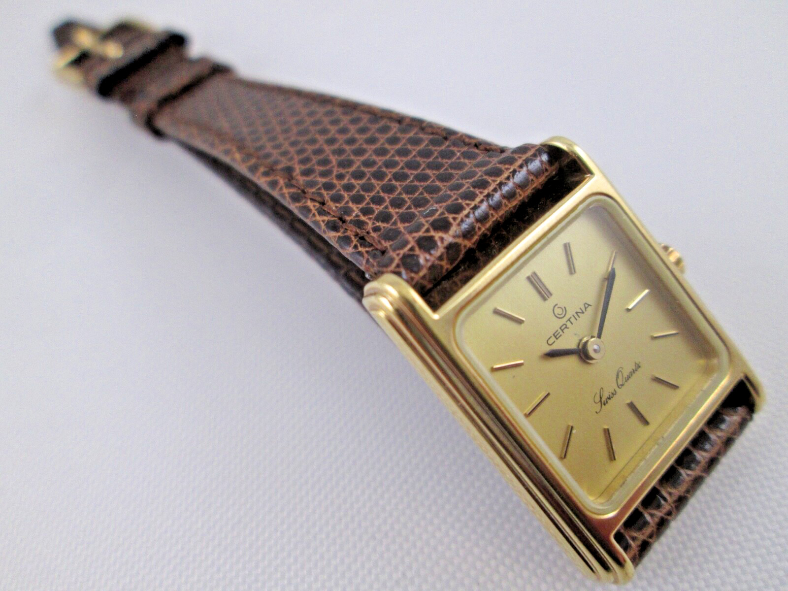 Certina lady’s quartz watch gold tone gold dial 18.5mm wide Swiss Made AS IS