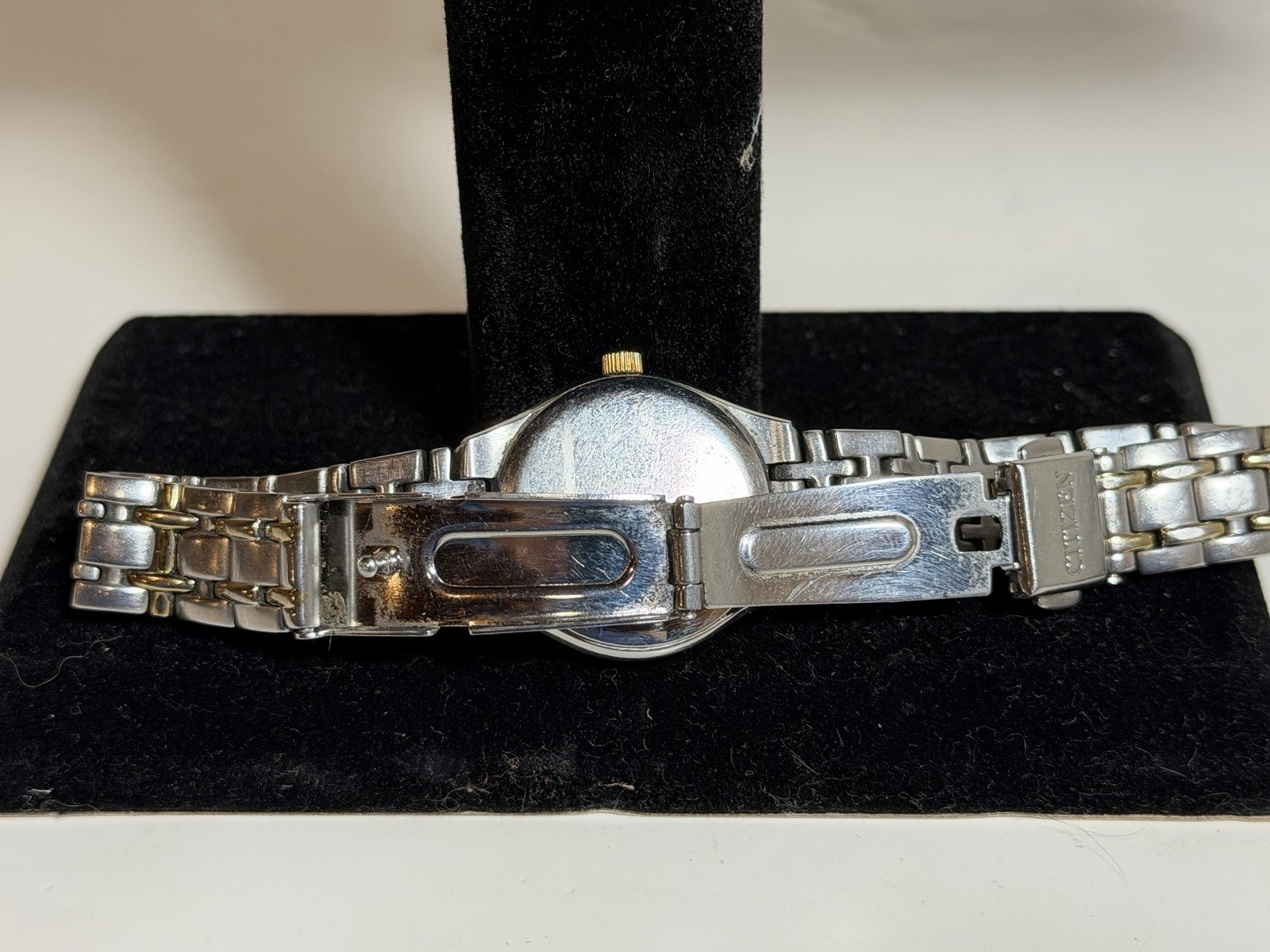Citizen Eco-Drive E011-S049571 White Dial Date Silver Gold Tone Woman’s Watch