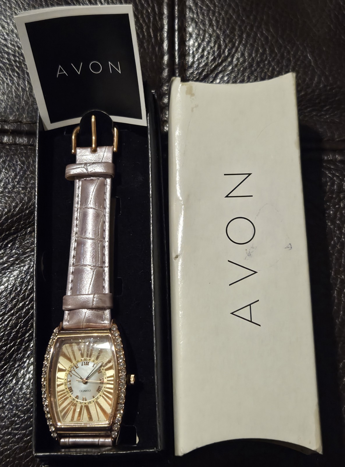 AVON Rose Gold/Rhinestone Rectangle Watch 9″ Lavender Faux Leather Band Unused