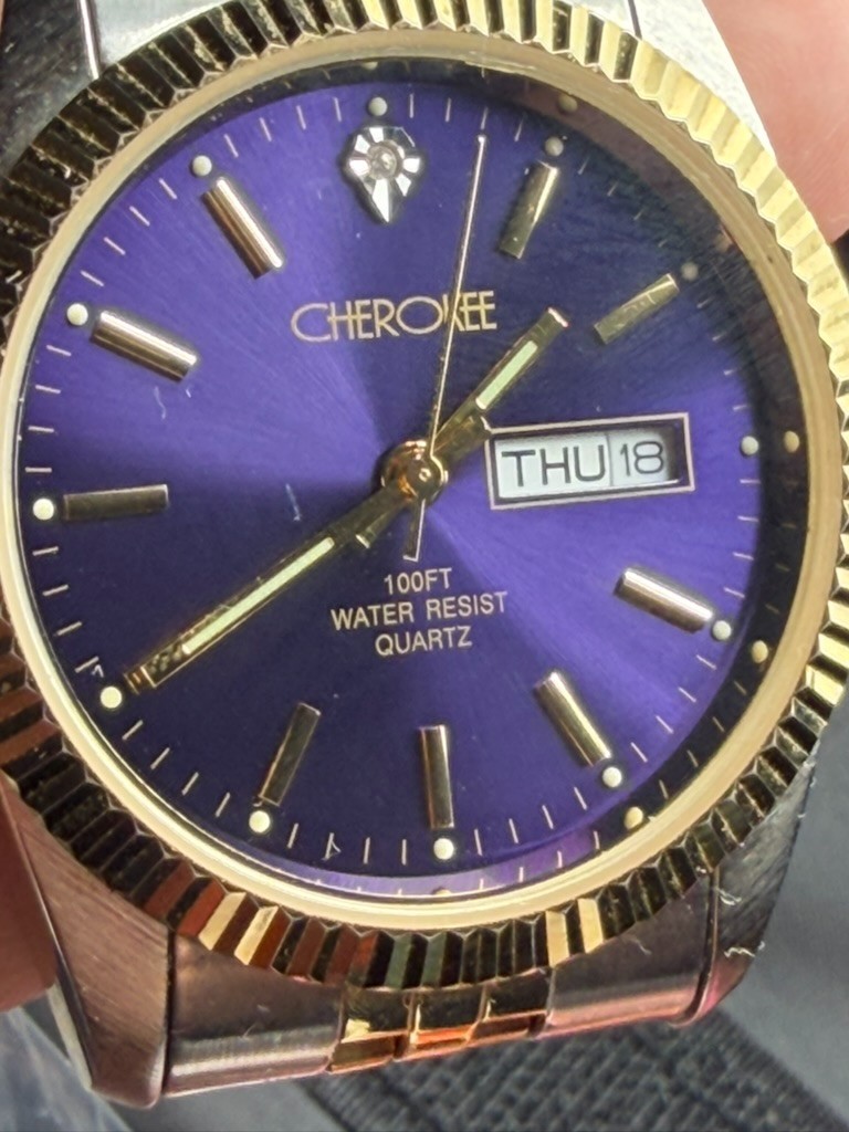 Cherokee Quartz Watch Day Date Blue Dial Two Tone Stretch Band Runs