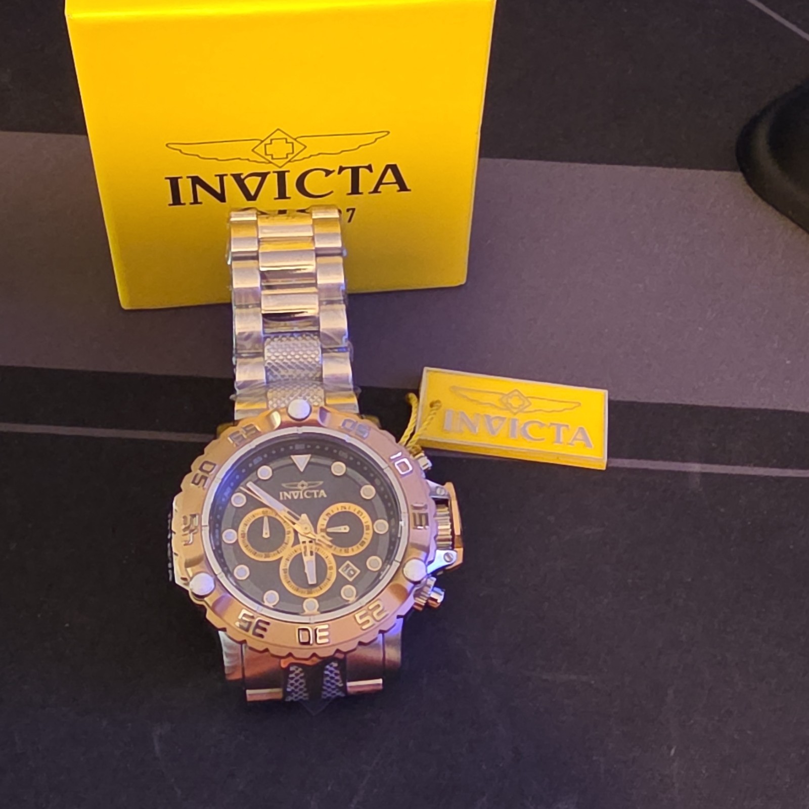 Invicta Men’s 55mm Quartz Chronograph Date/ Black Dial Gold Bezel SS Bracelet