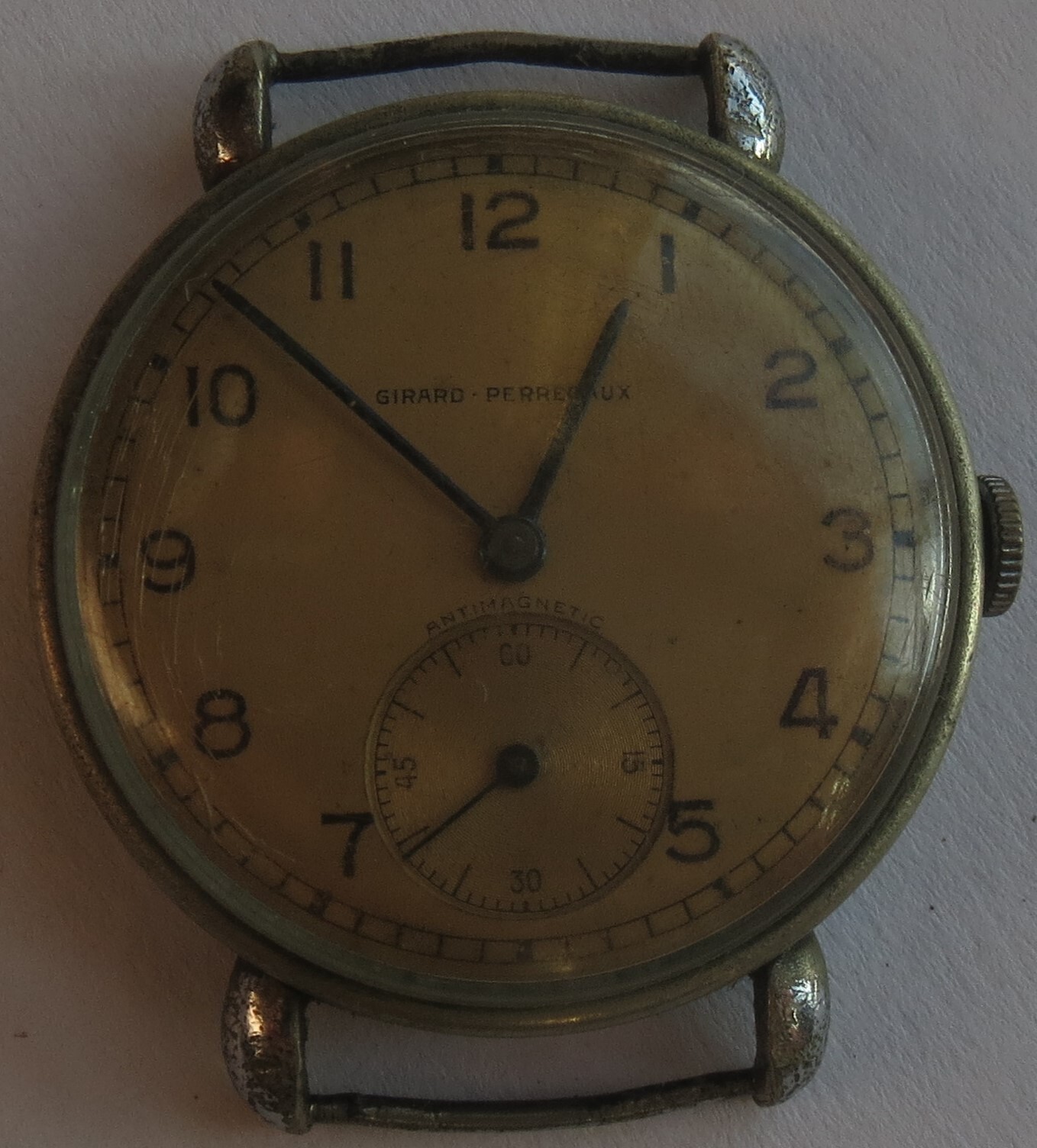 Girard Perregaux mens wristwatch nickel chromiun case 34 mm. in diameter