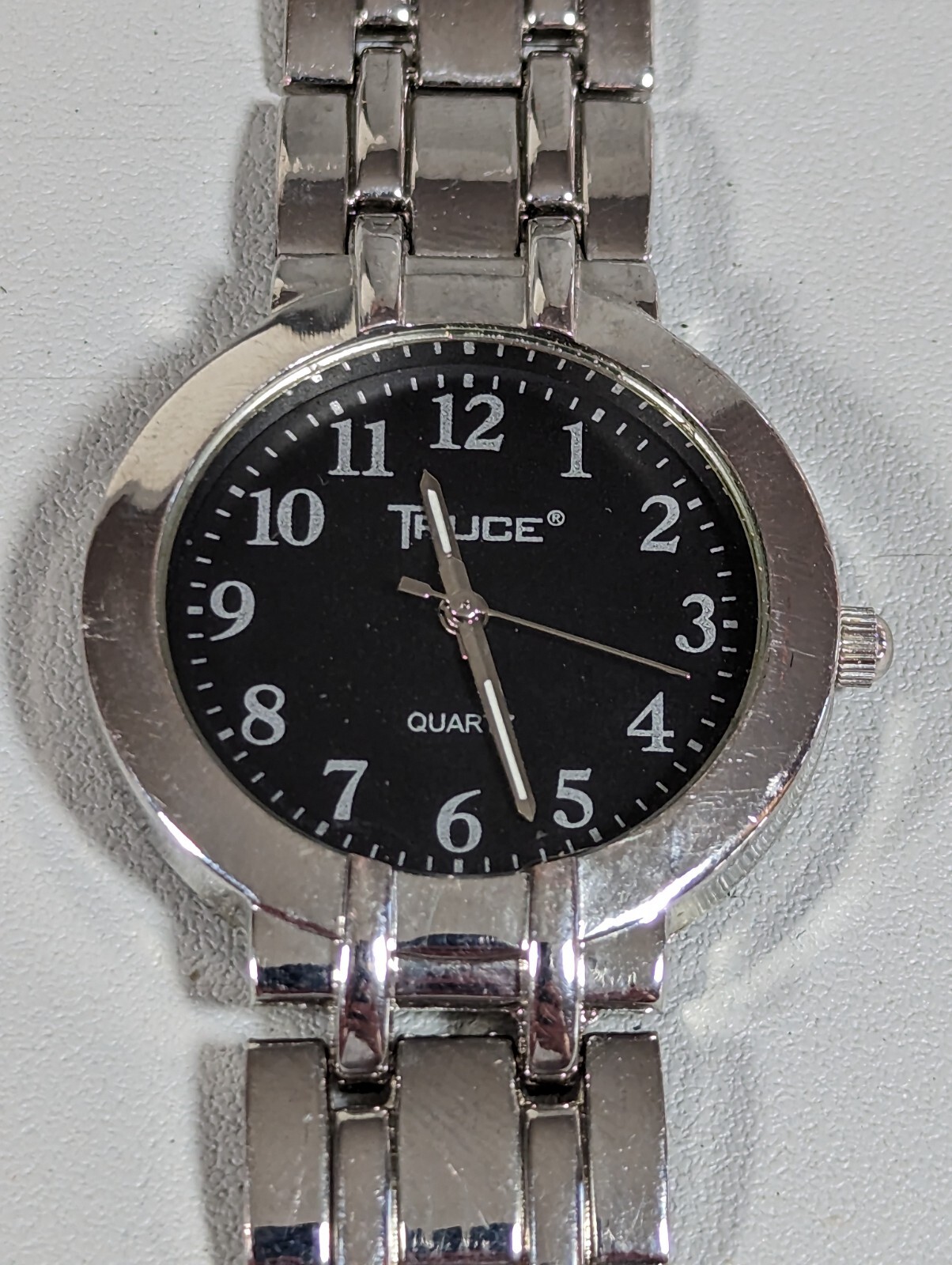 Truce Black Dial Round Silver Tone Case Link Band Watch