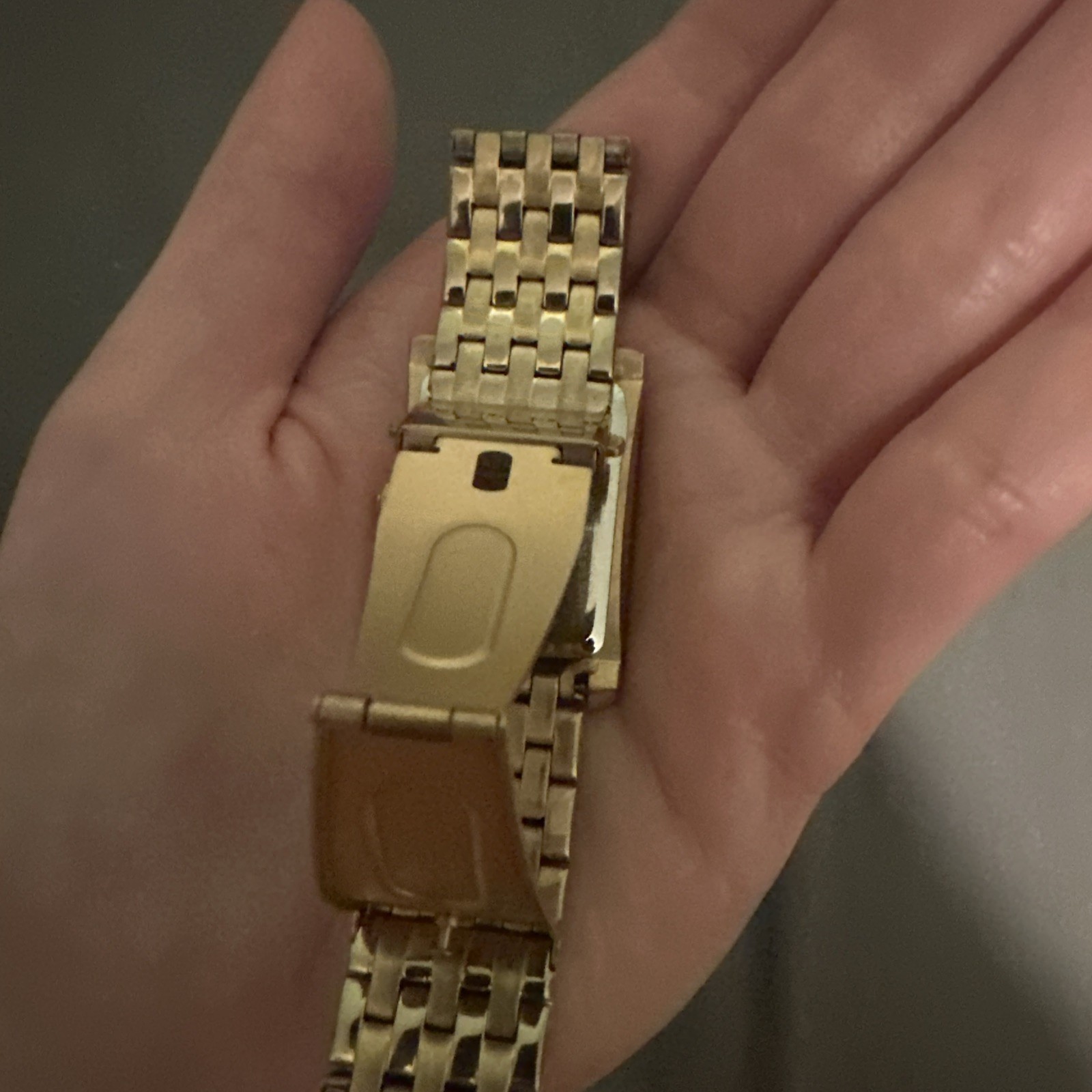 Caravelle New York Women’s Gold Diamond Accent Rectangle Watch Black Dial