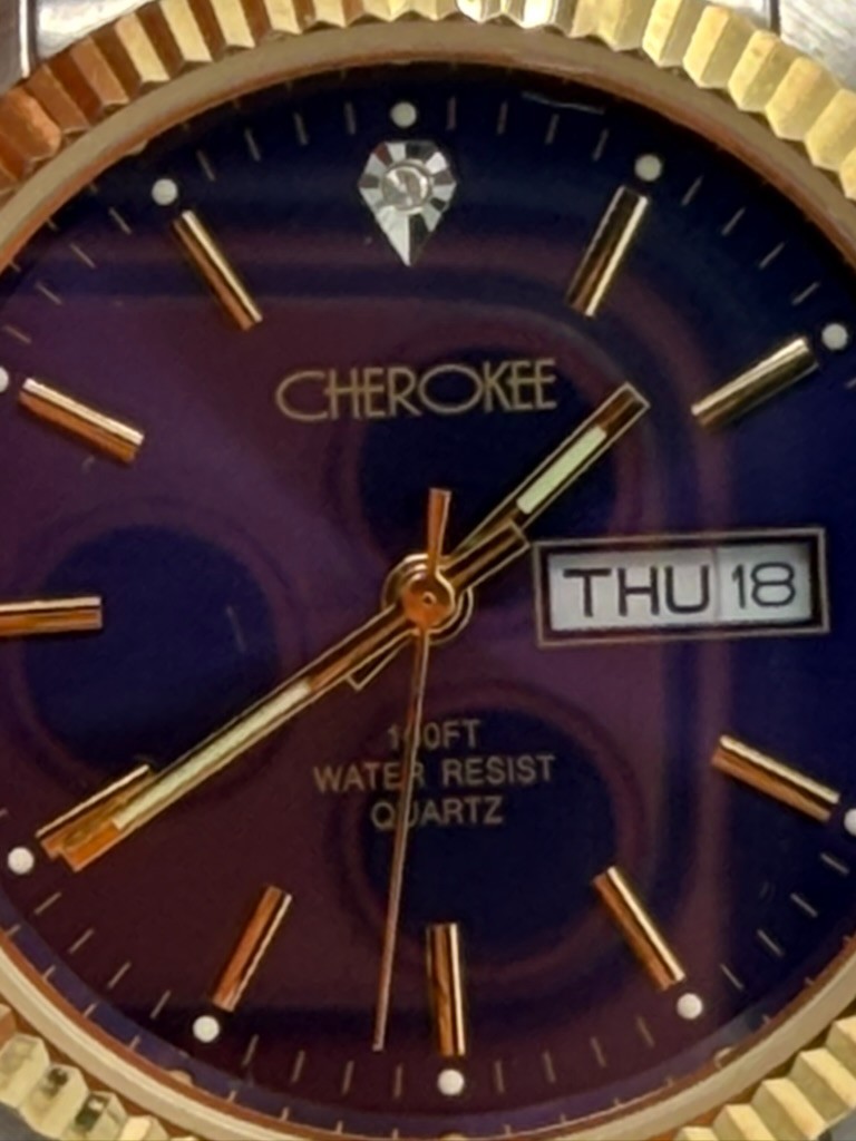 Cherokee Quartz Watch Day Date Blue Dial Two Tone Stretch Band Runs
