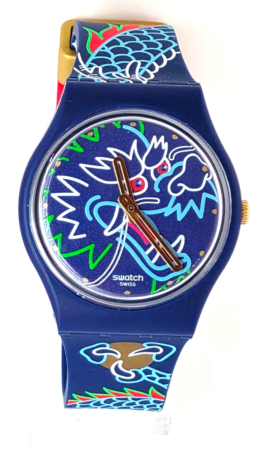 SWATCH SWISS MADE SO28Z125 MODEL DRAGON IN WAVES, BAND AND FACE INTERTWINE NIB
