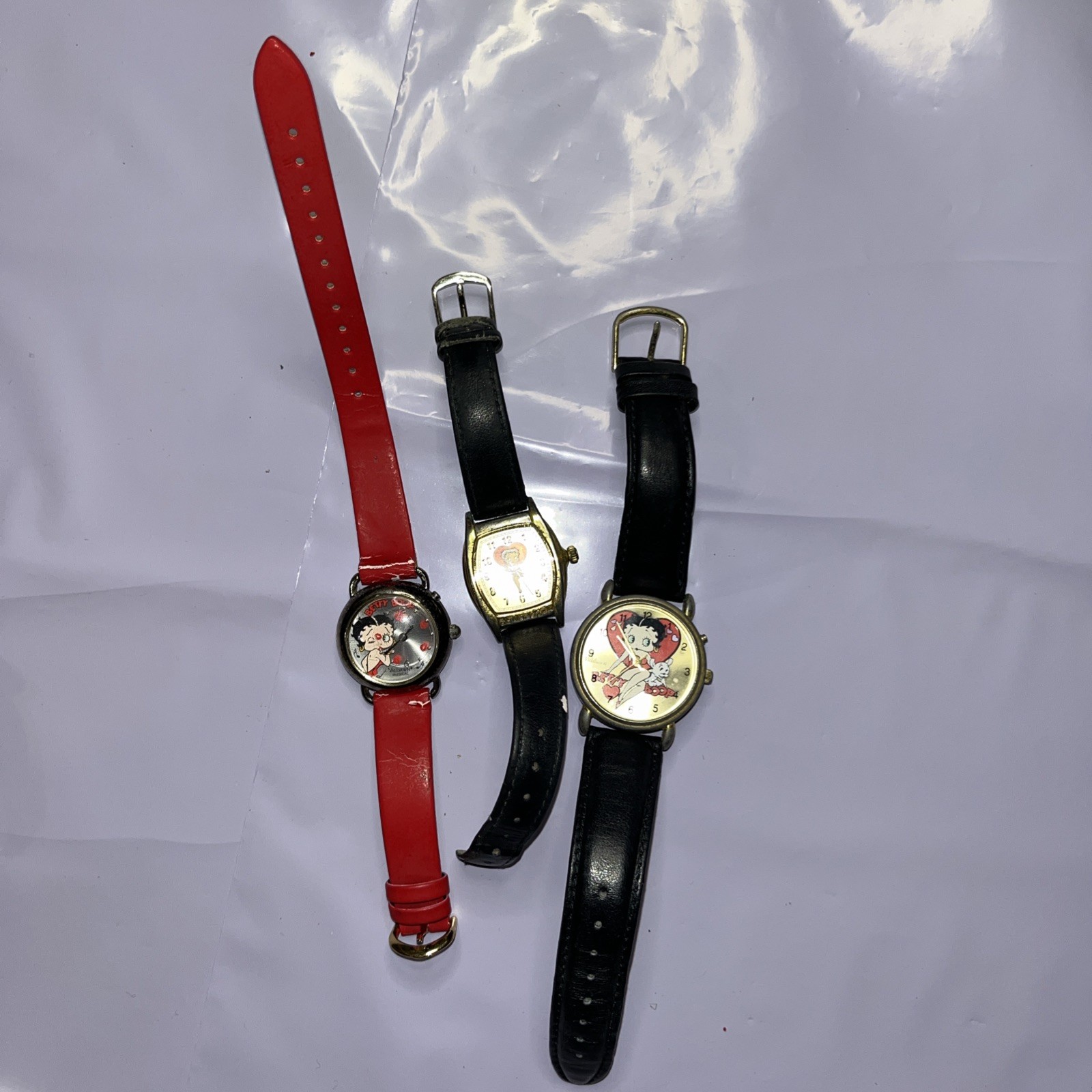 3 Vintage Betty Boop watches parts and 2 work