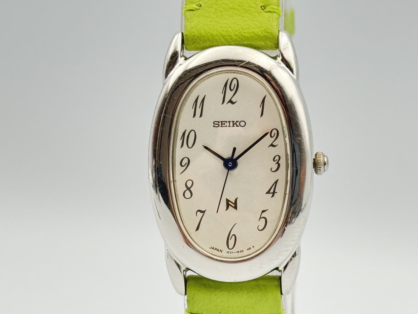 SEIKO Noie 1F21-5B70 Vintage Silver Oval Quartz Cream Dial Blue Hands Watch #3