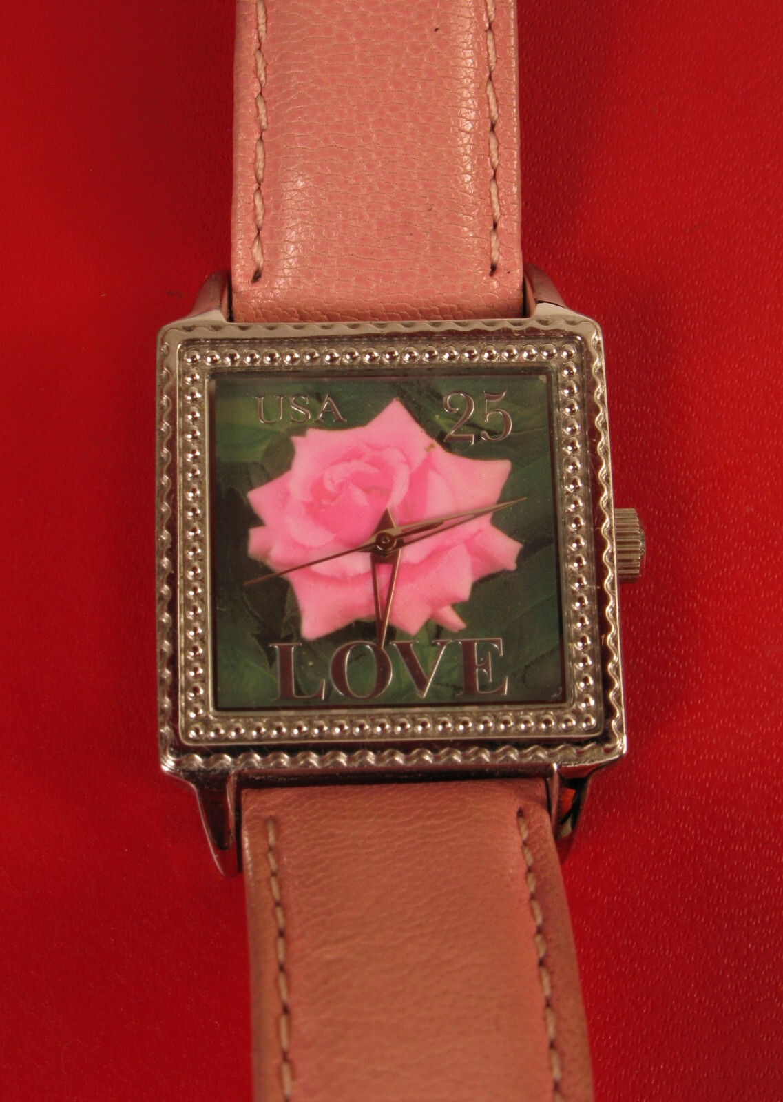 ARJANG LOVE STAMP WATCH NOT WORKING MAY JUST NEED A BATTERY PREVIOUSLY LOVED !!