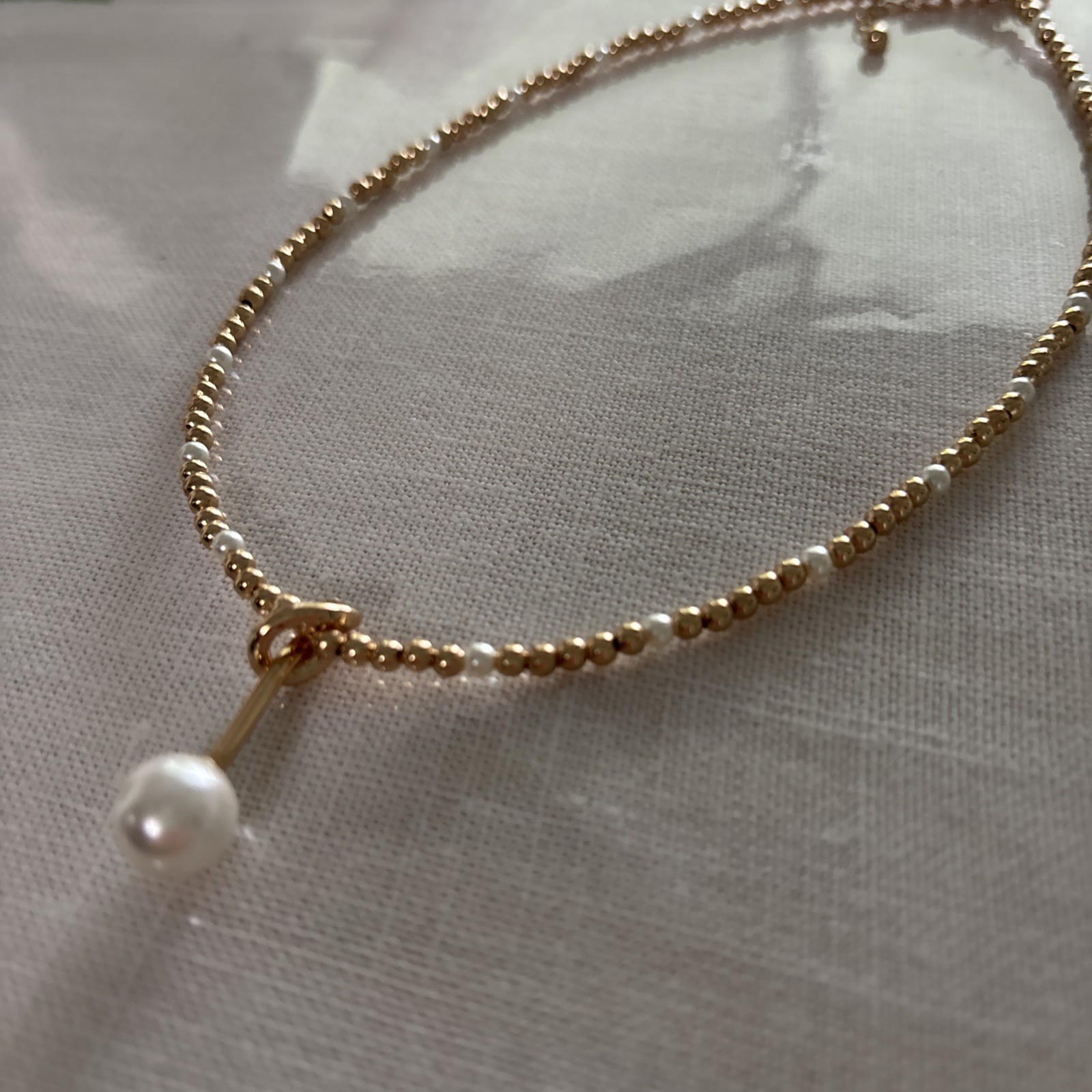 New Collection Of Jewelry. Watch. Baby Gold And Pearl Neck. One Pear Hangs Down