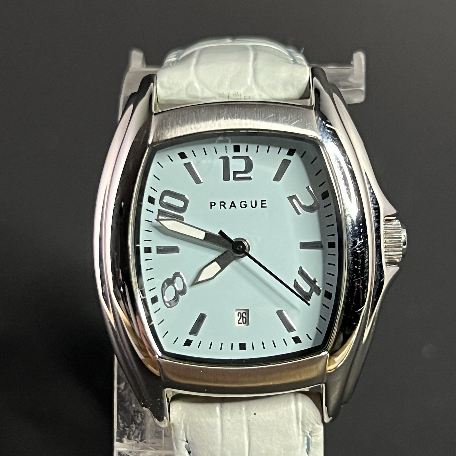 Prague 31mm Silver Tonneau Case Powder Blue Dial Silver Numbers Watch On Blue