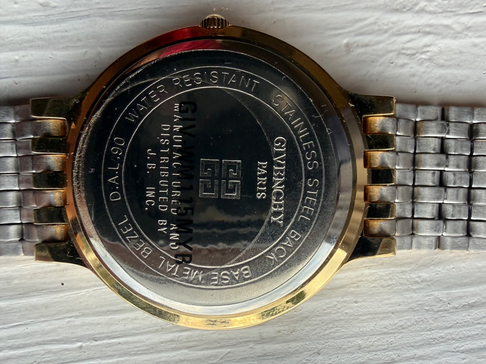 Givenchy Vintage Gold-Tone Quartz Wristwatch Featuring Roundcase, Champagne Dial