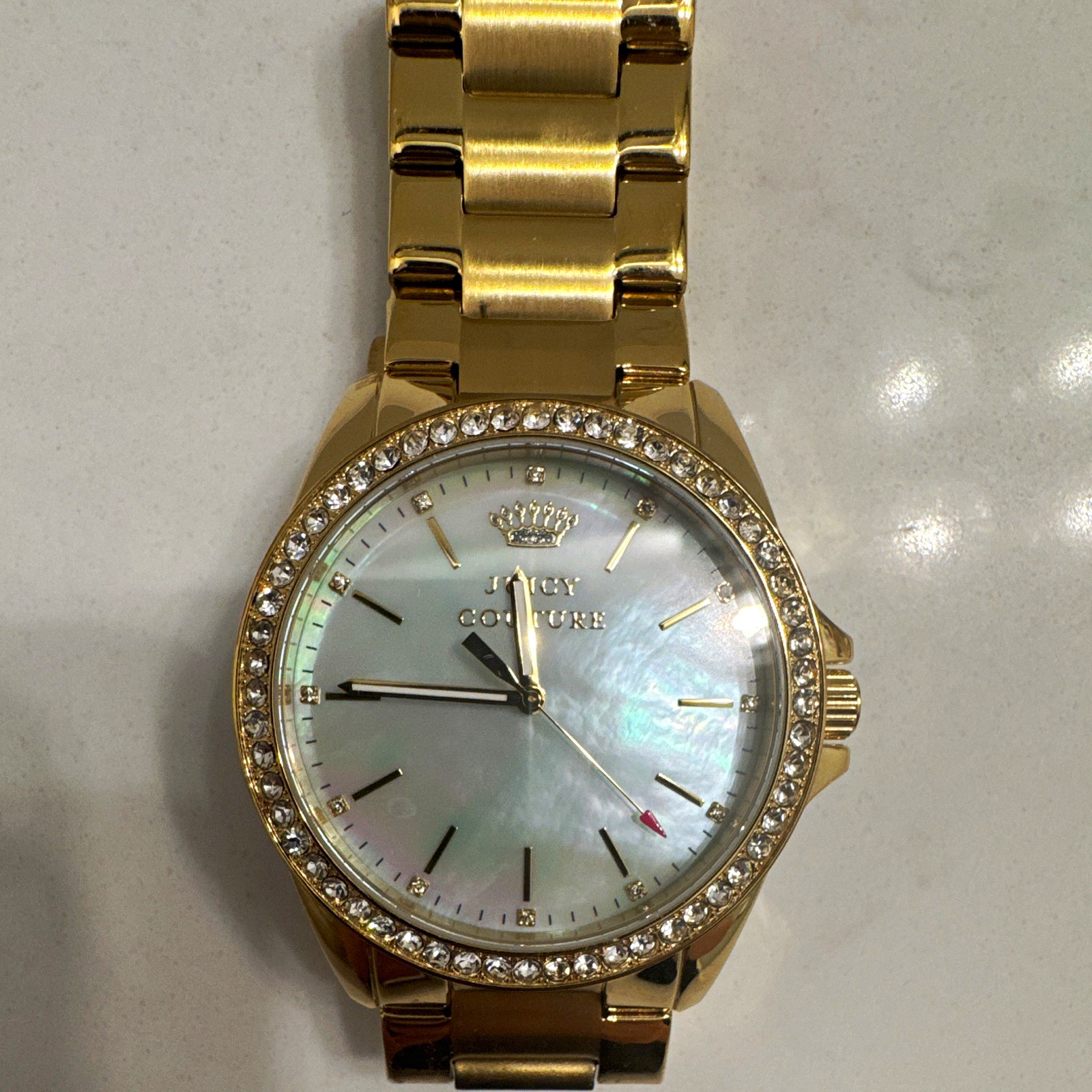 Juicy Couture Women’s Gold Tone Quartz 40mm MOP Dial Gem-Set Bracelet