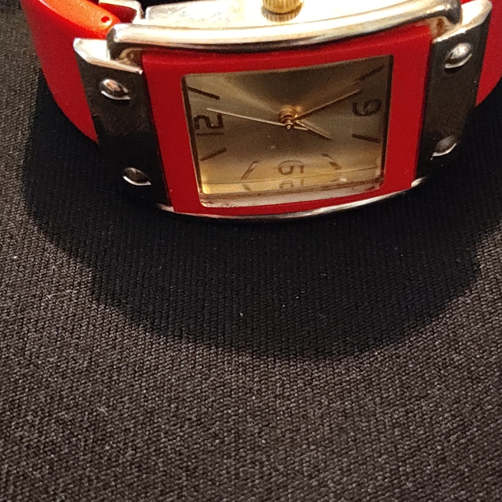 Rectangular Wristwatch Red Bangle Silver Red Case Analog Gold Sunburst Dial.