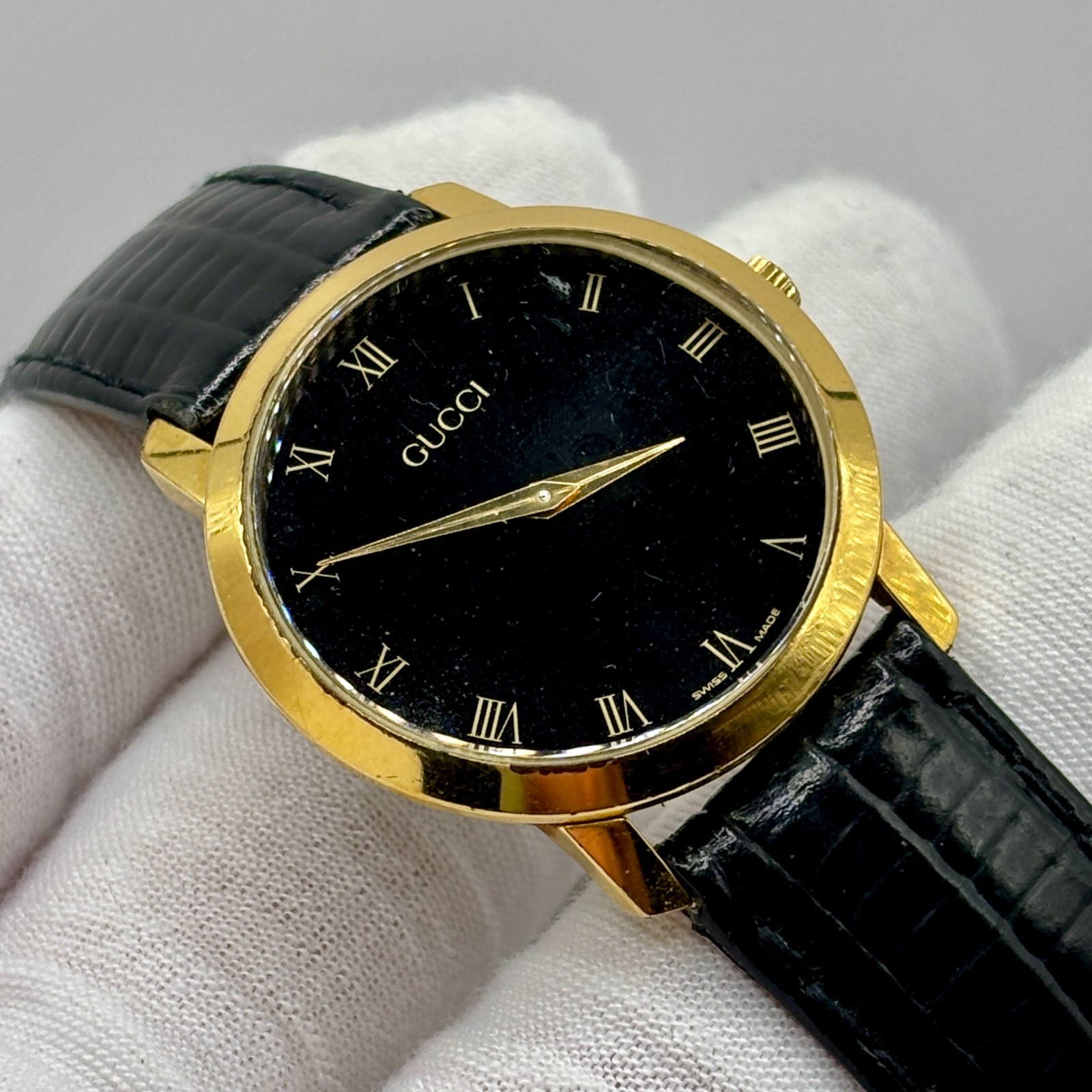 Vintage Gucci 2200M Gold Tone Black Dial Roman Numerals Swiss Quartz Watch