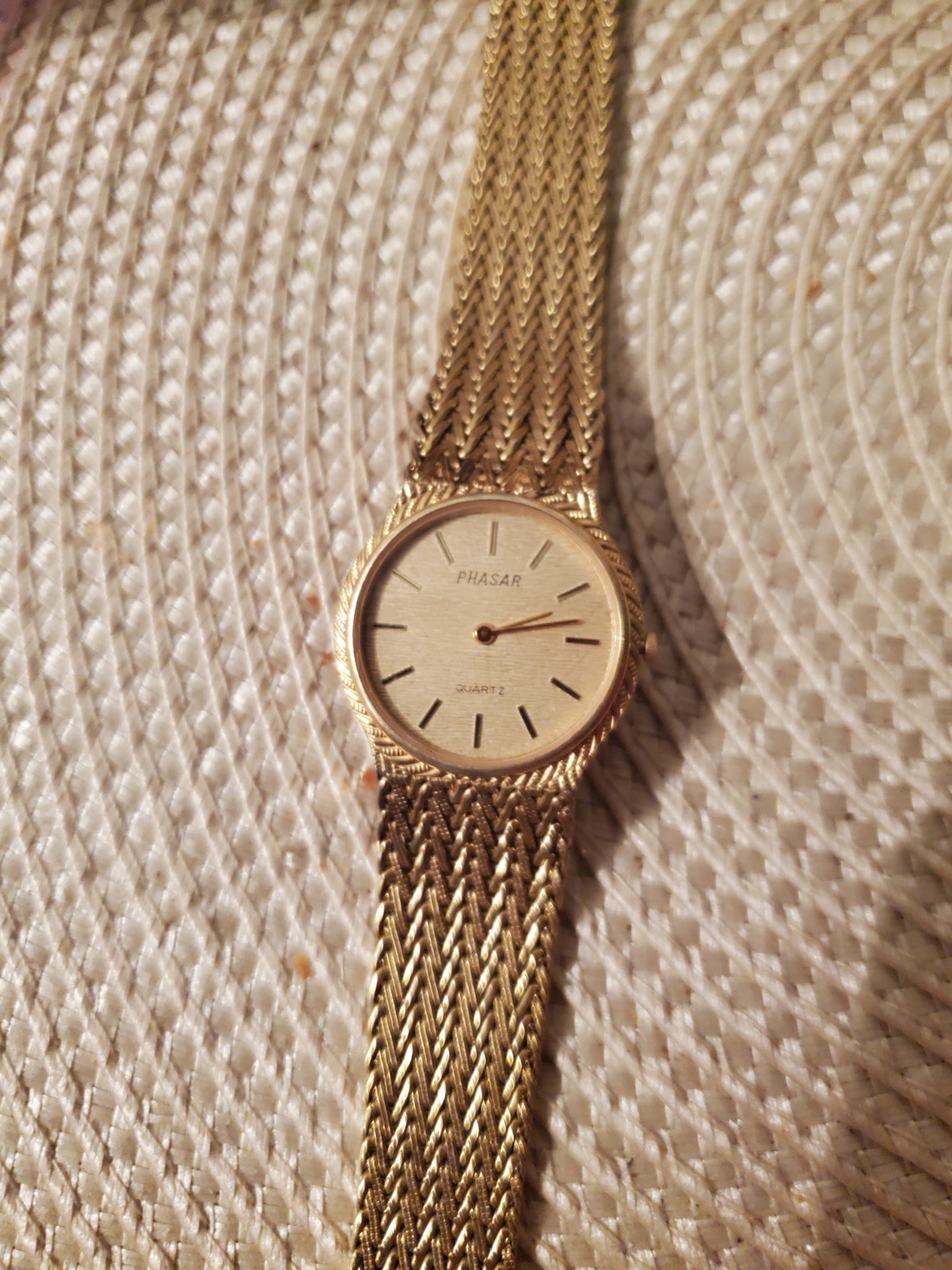 gold phasar watch