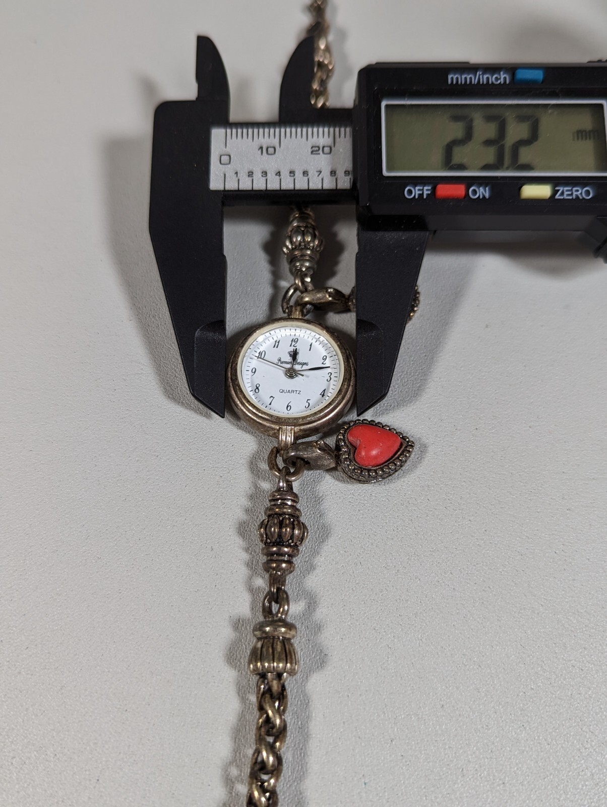 Premier Designs White Dial Silvertone Case Red Blue Stone Peace Love Charm Watch