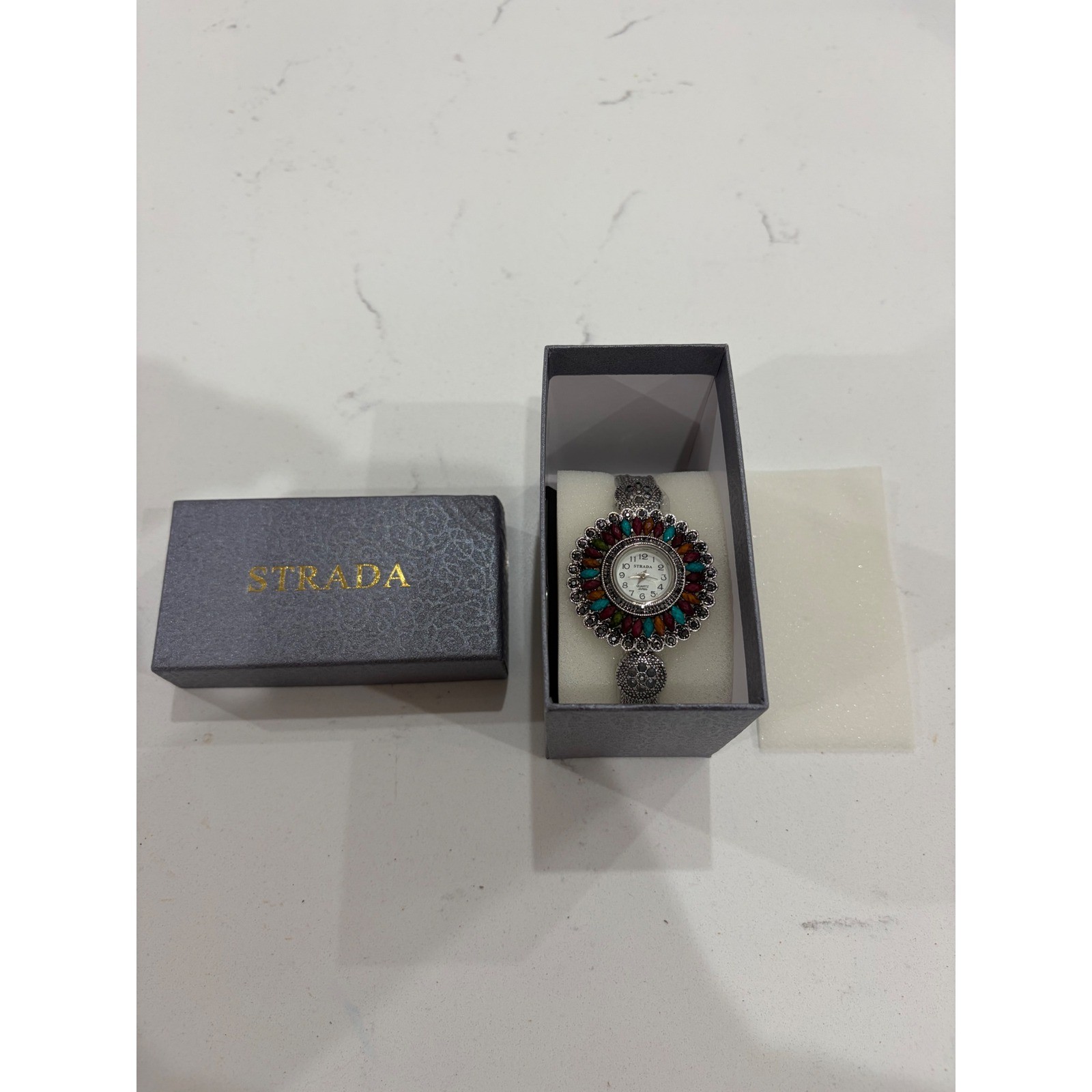 Strada Womens Quartz Watch Multi Color Gemstone Bezel Silver Tone Filigree Box