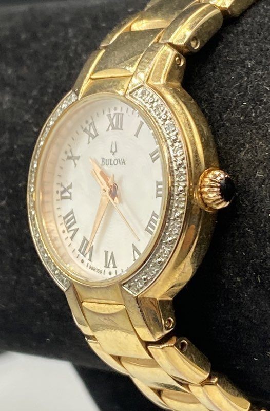 Bulova 98R156 Women’s Gold Tone Diamond Bezel Mother of Pearl Dial Watch 27mm