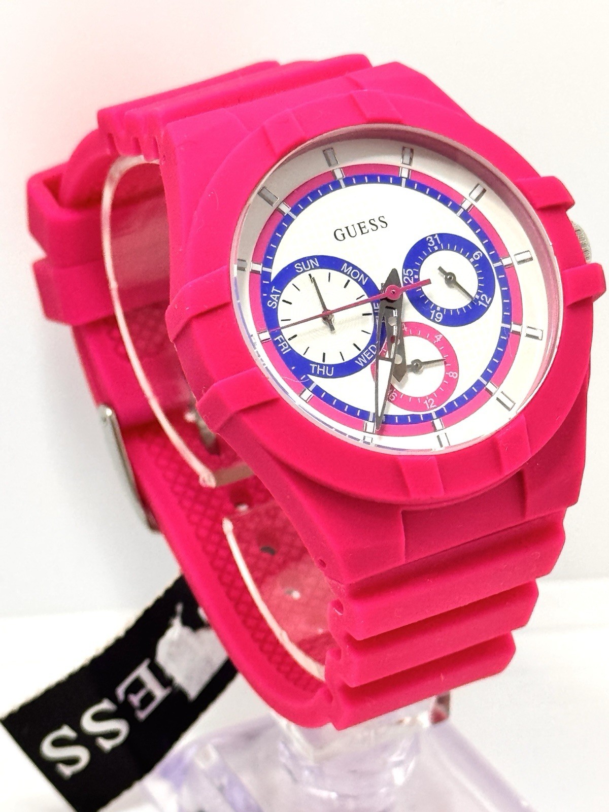 GUESS Ladies Pink Rubber Band Watch with a White Analog Dial and Multicolor