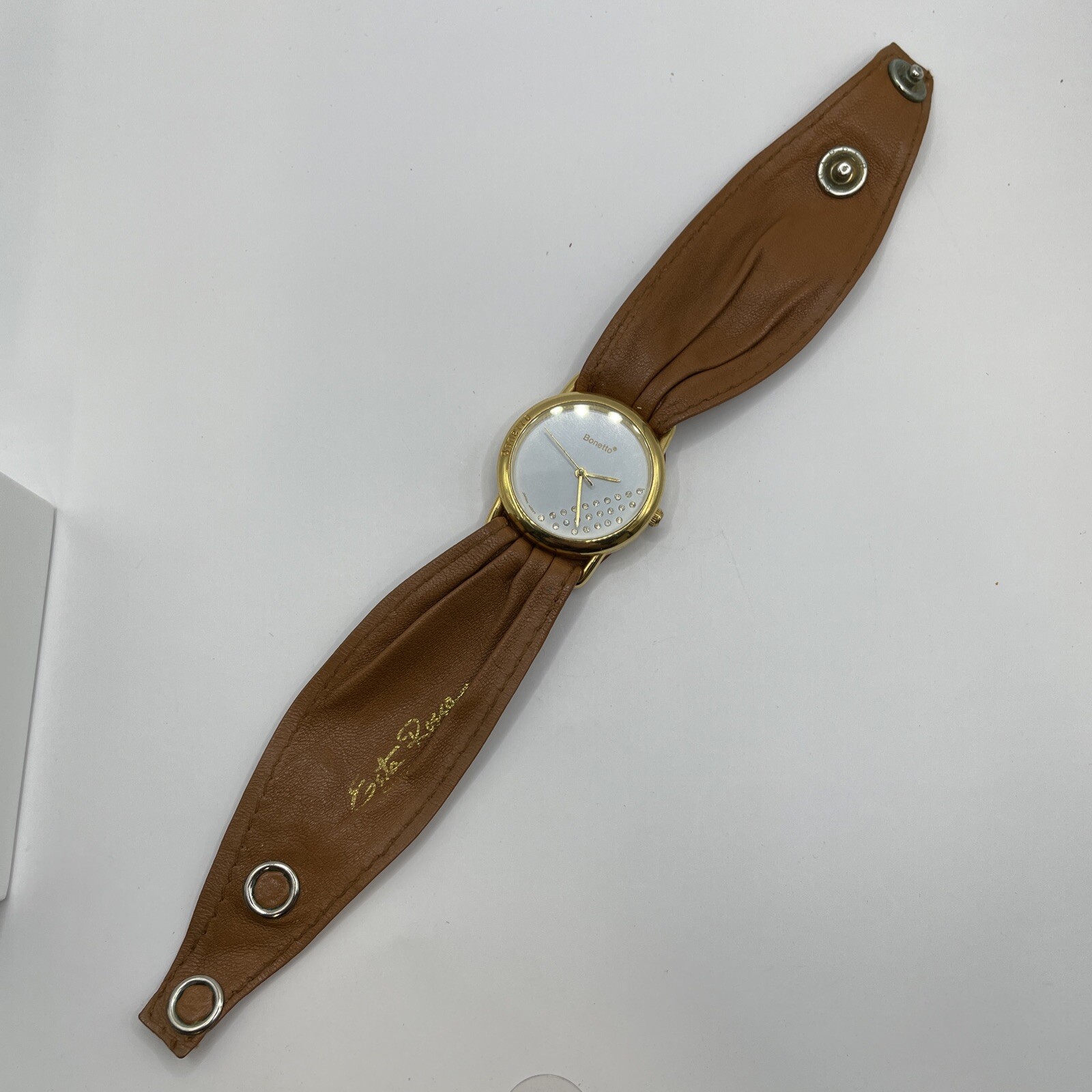 Bonetto watch,ladies.gold case brown leather band with snaps