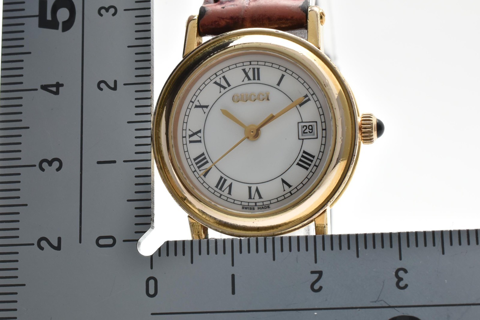 GUCCI 7200L Quartz Women’s Watch White Roman Dial Date Gold Tone Leather 26 mm