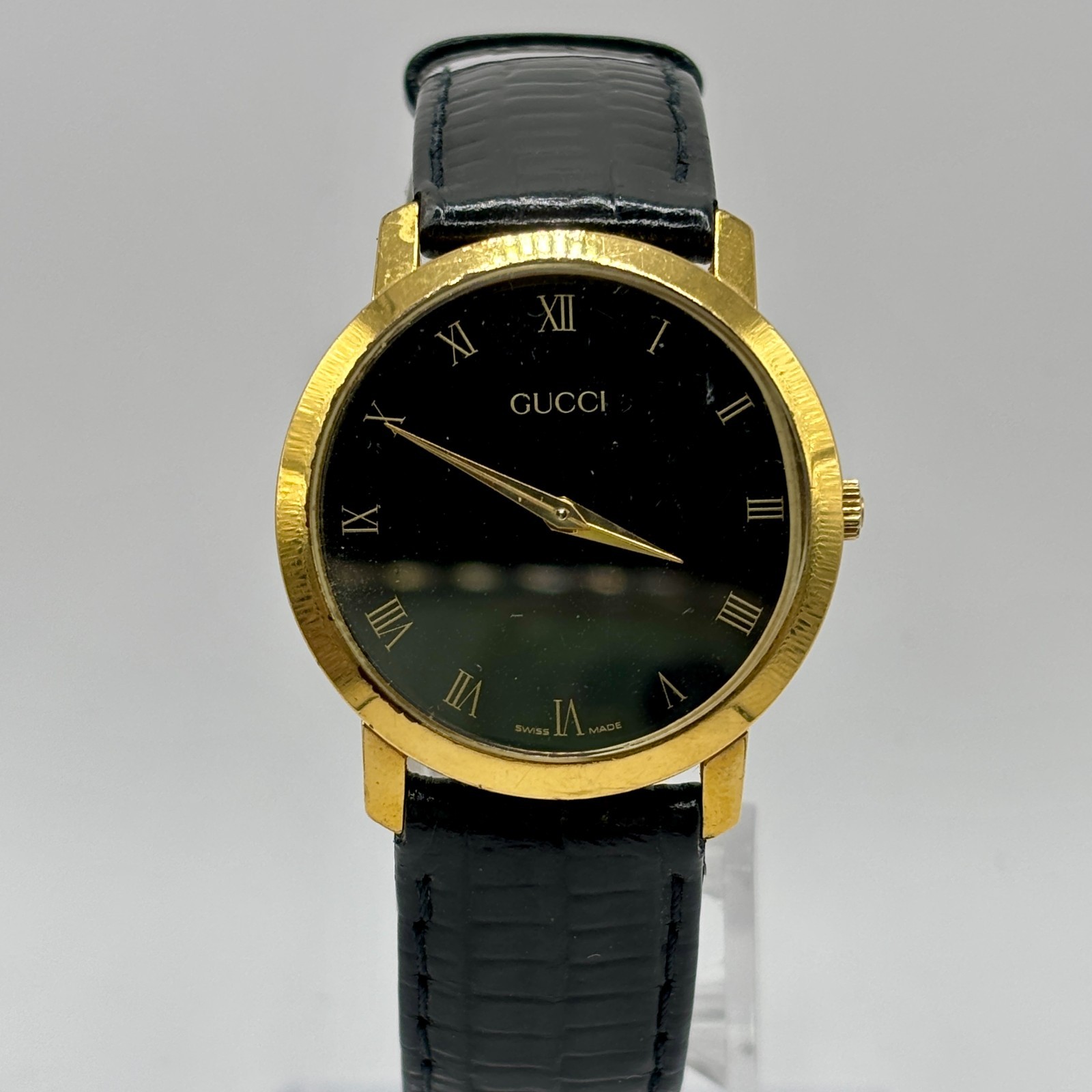 Vintage Gucci 2200M Gold Tone Black Dial Roman Numerals Swiss Quartz Watch