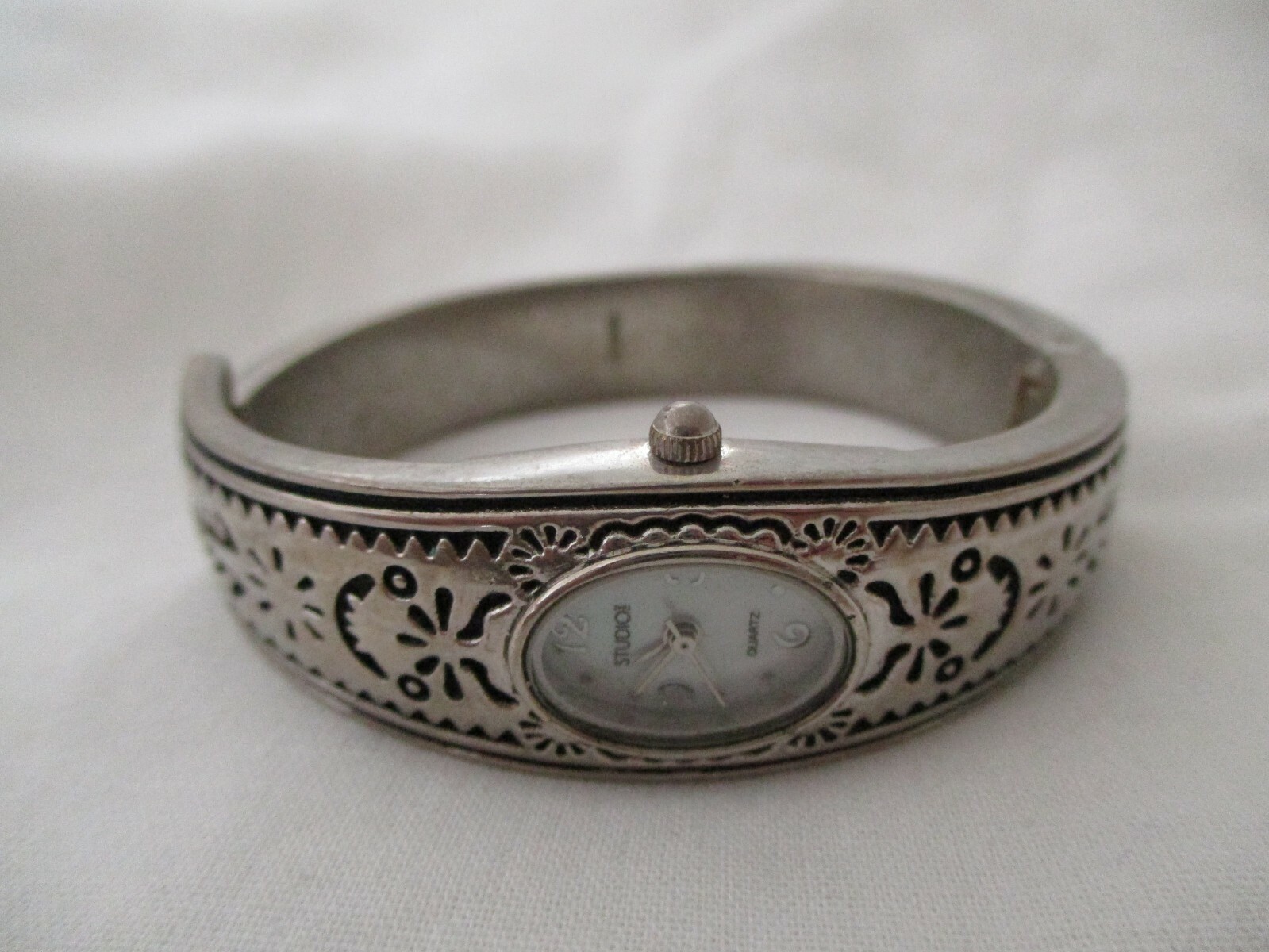 Silvertone Studio Time Cuff Watch, Oval Mother of Pearl Face, Pressed Metal Band