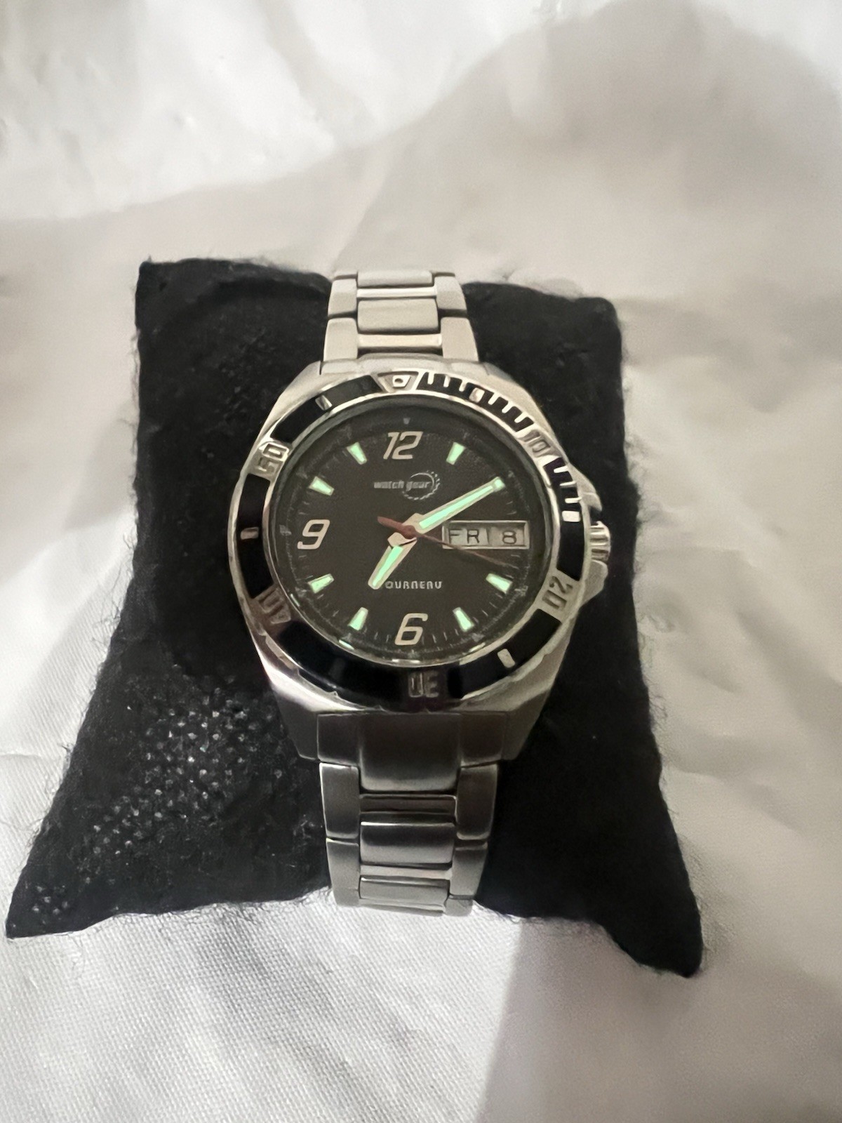 TOURNEAU,Watch Gear,day/date, rotating Bezel,32mm,WR100M,St/Steel ladies