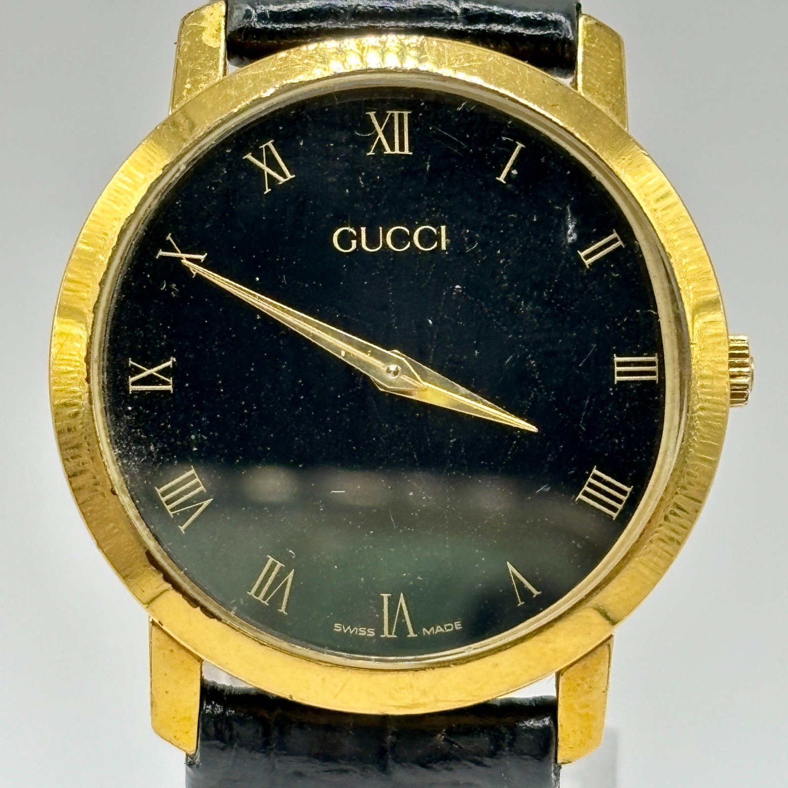 Vintage Gucci 2200M Gold Tone Black Dial Roman Numerals Swiss Quartz Watch
