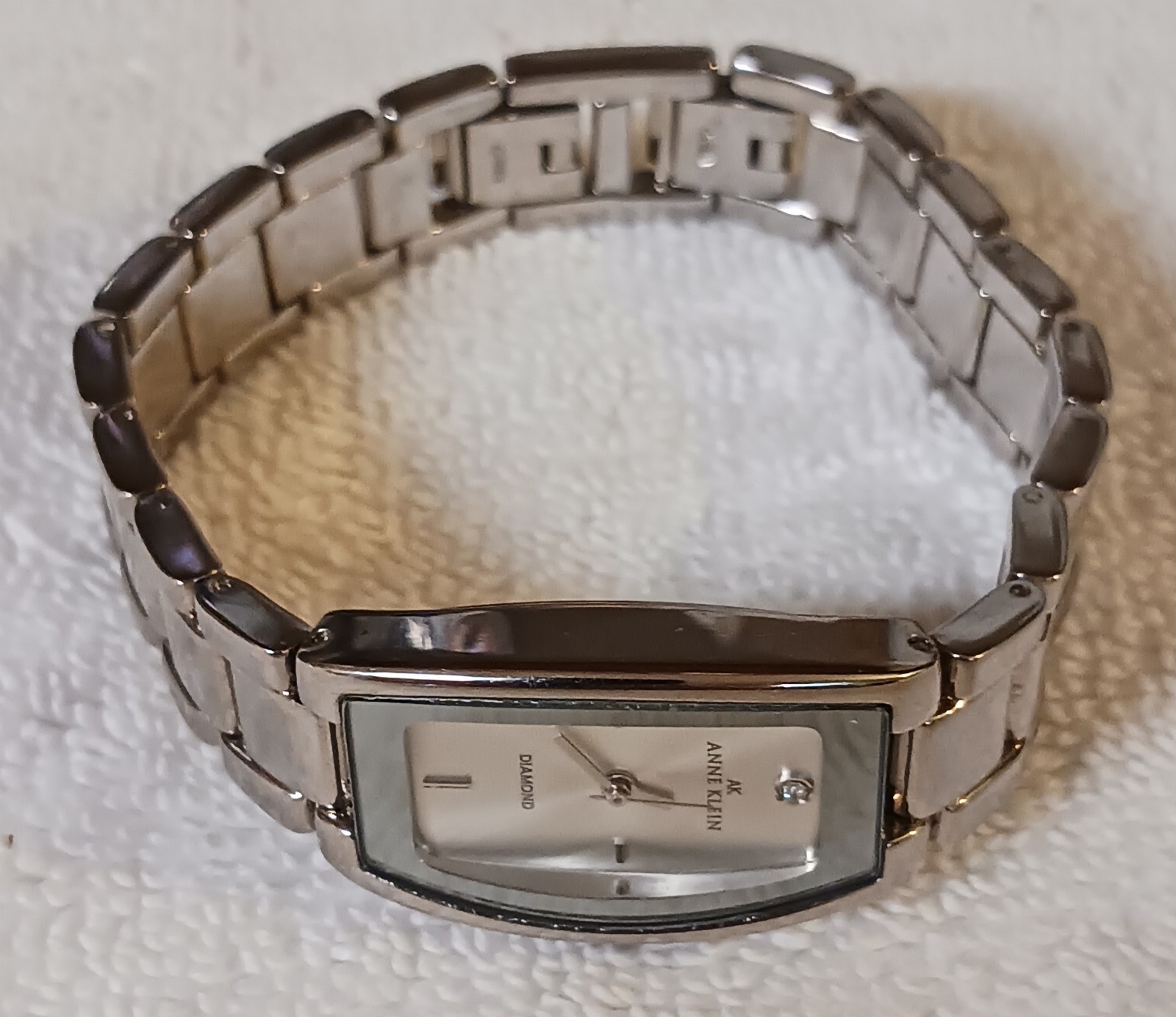 Anne Klein Women’s Quartz Analog Watch With A Diamond Accent At The 12 O’ Clock